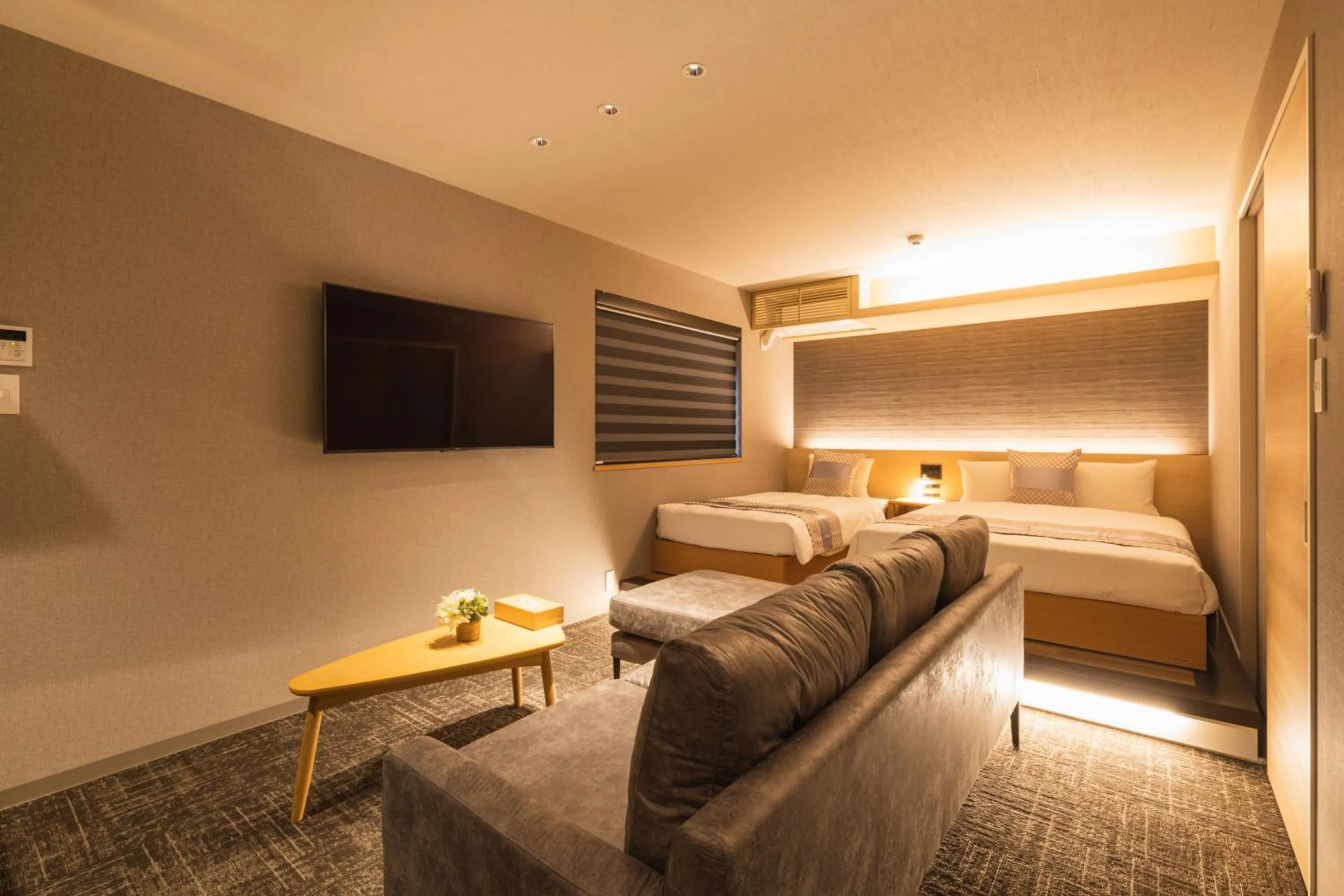 Photo of the whole room, Bed in GRAND BASE Kagoshima Chuo