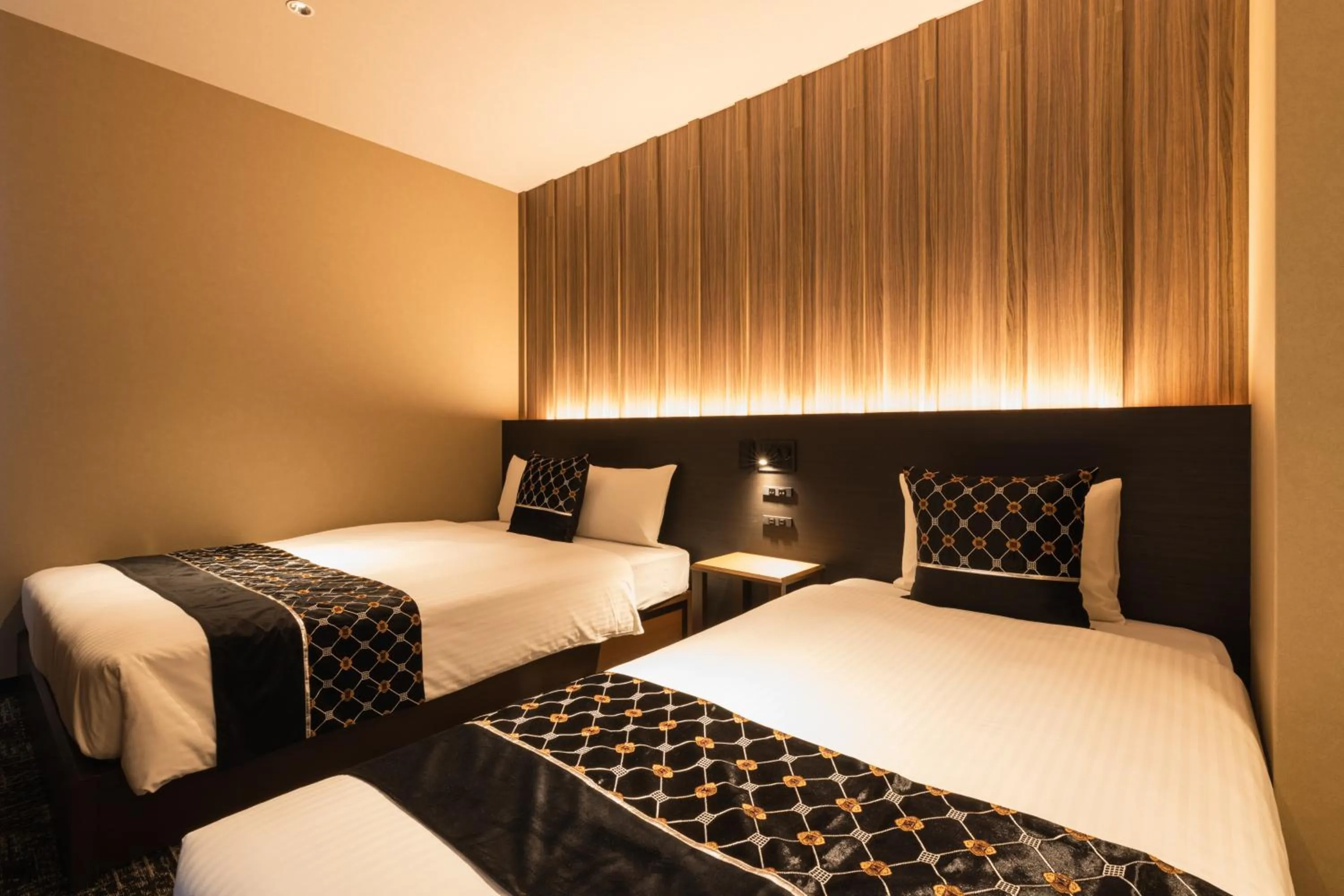 Bed in GRAND BASE Kagoshima Chuo