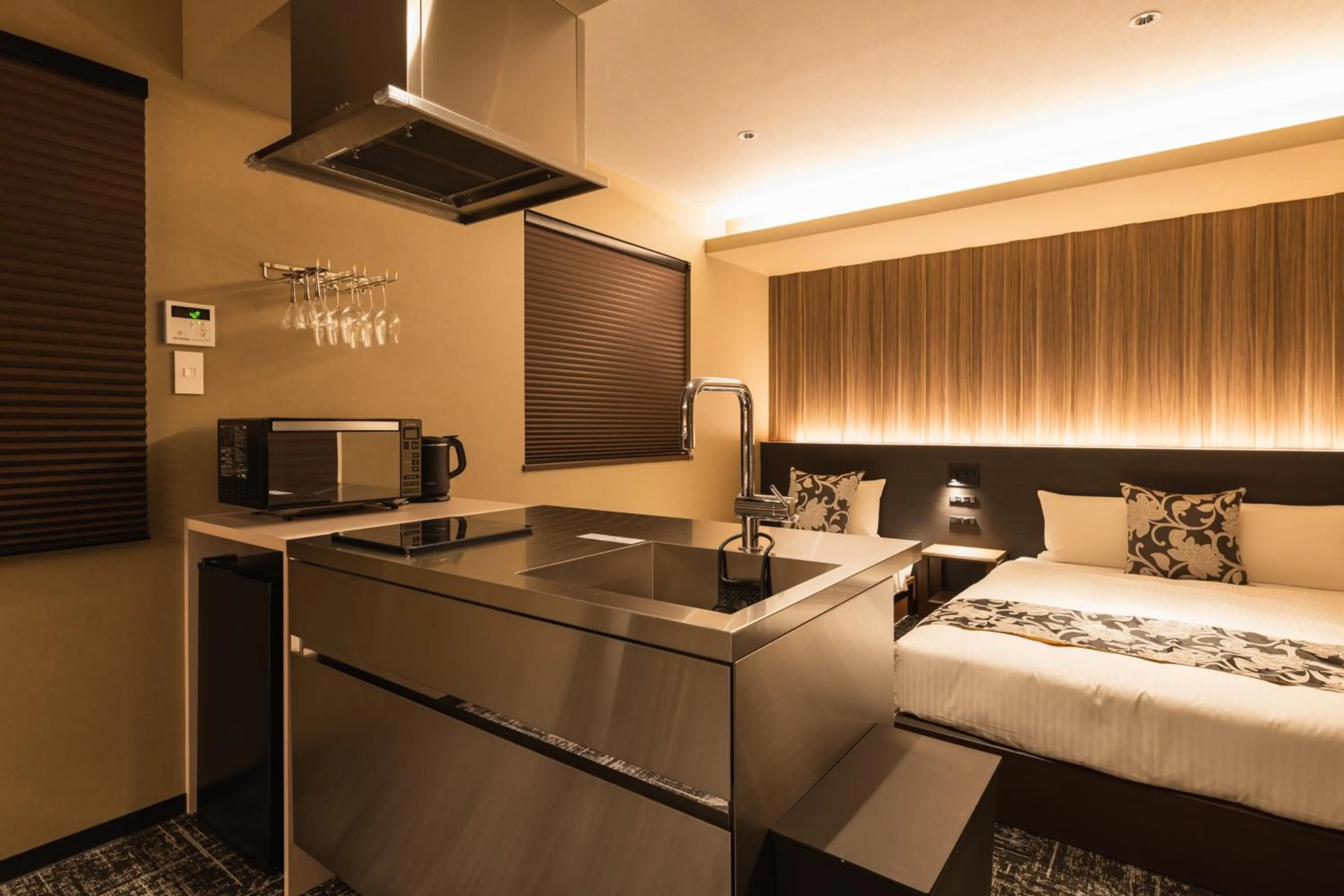 Kitchen or kitchenette, Bed in GRAND BASE Kagoshima Chuo