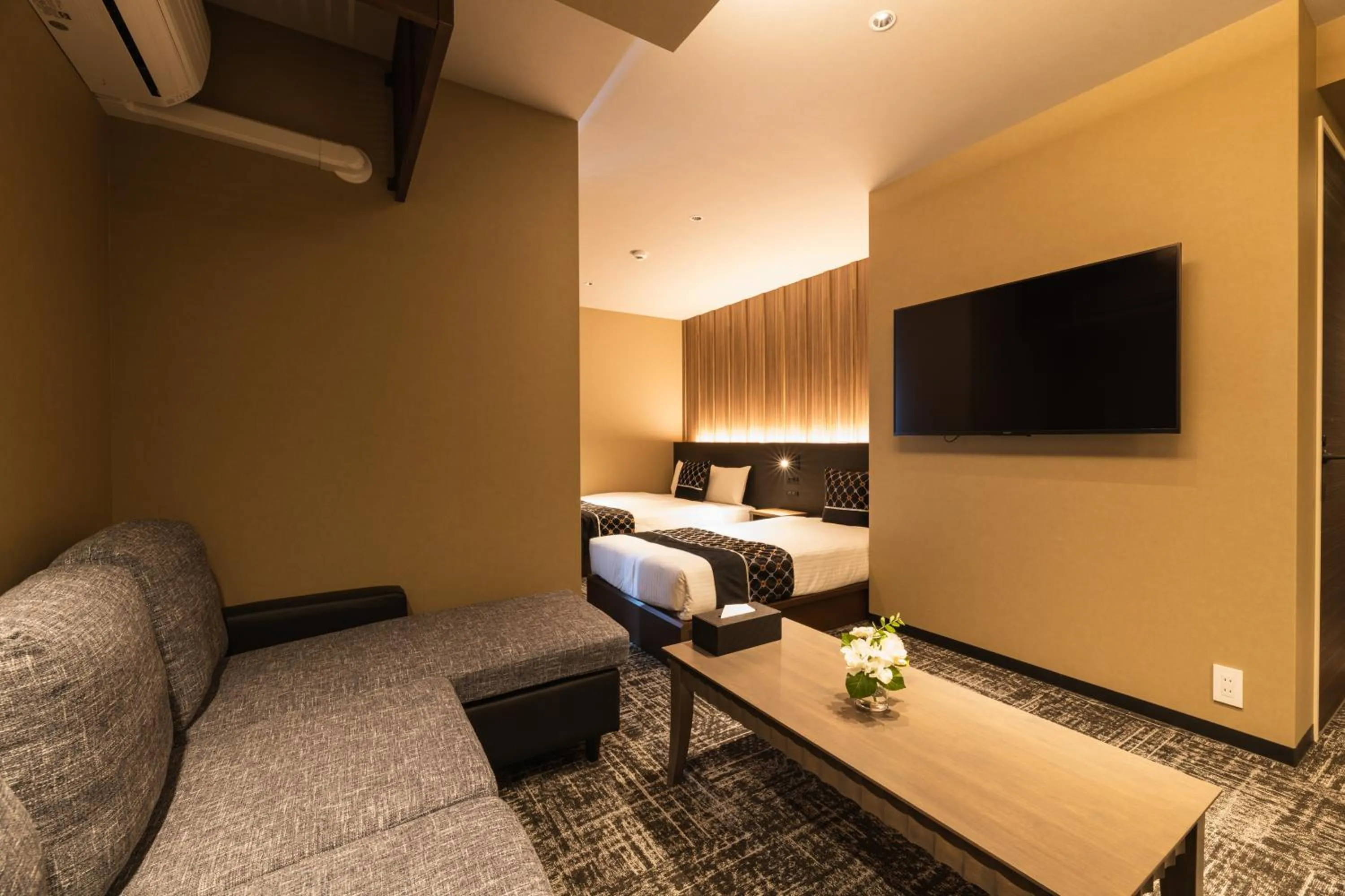 Photo of the whole room, Bed in GRAND BASE Kagoshima Chuo