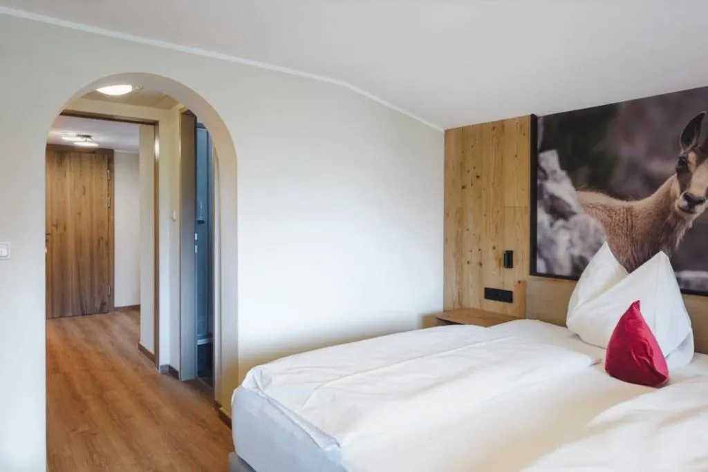Bed in Boutiquehotel Acherl