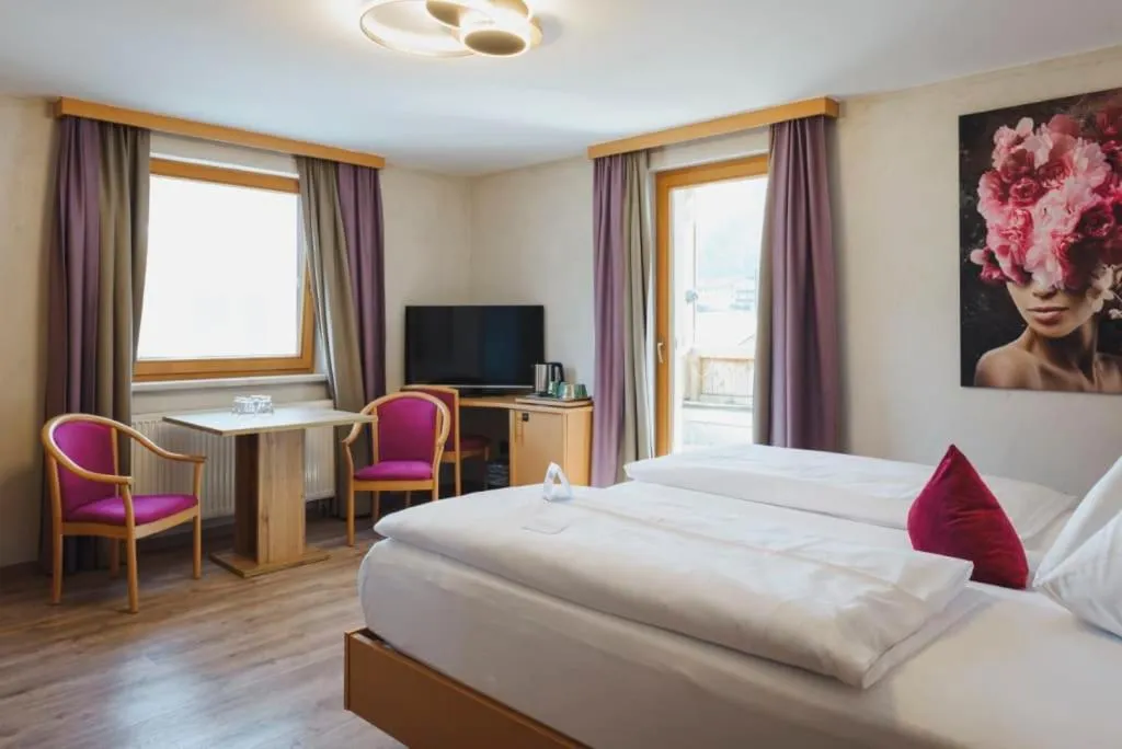 Bed in Boutiquehotel Acherl