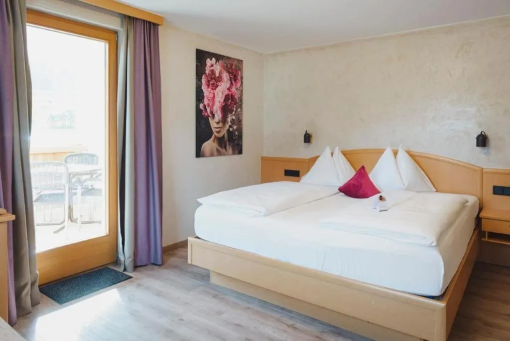 Bed in Boutiquehotel Acherl