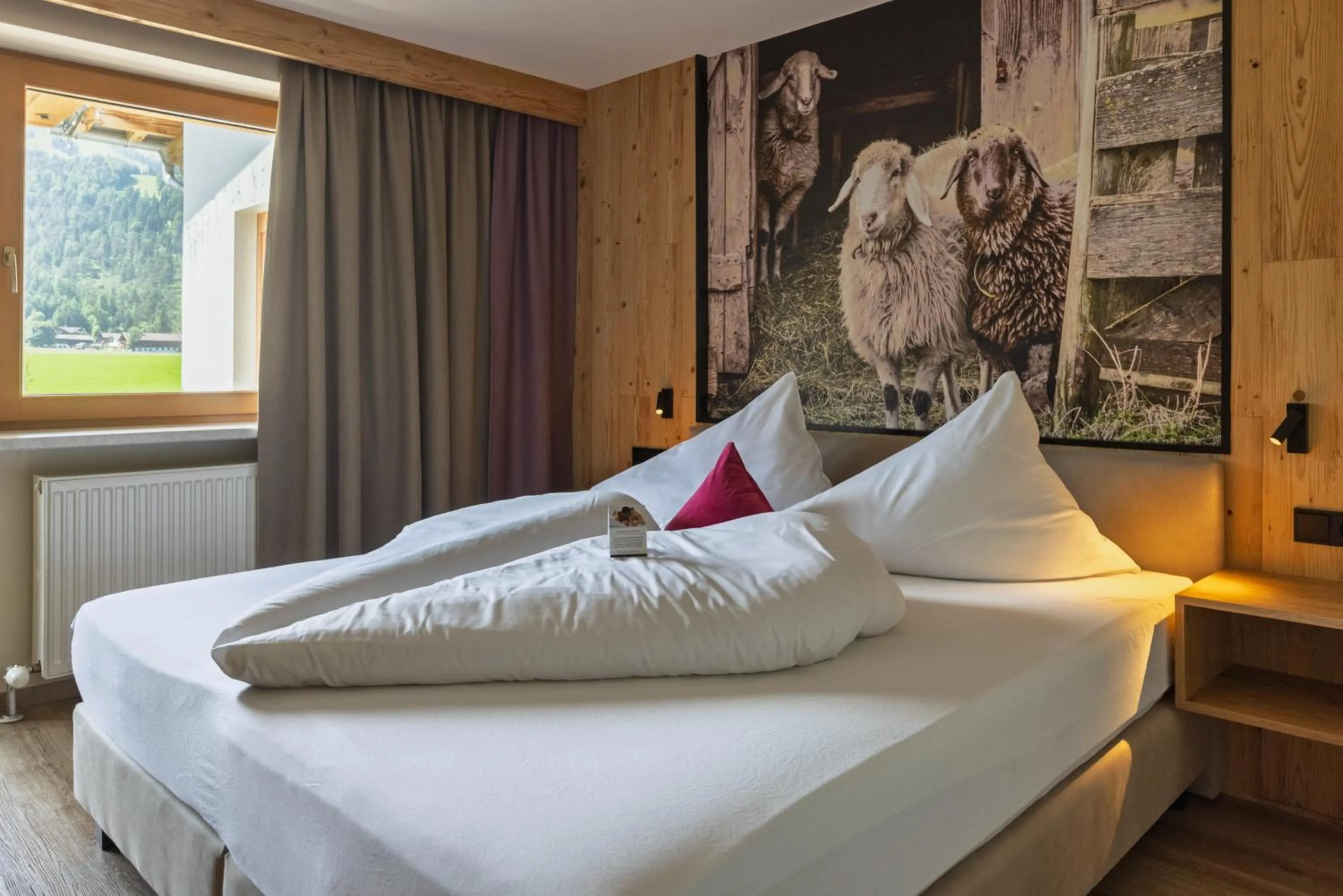Bed in Boutiquehotel Acherl