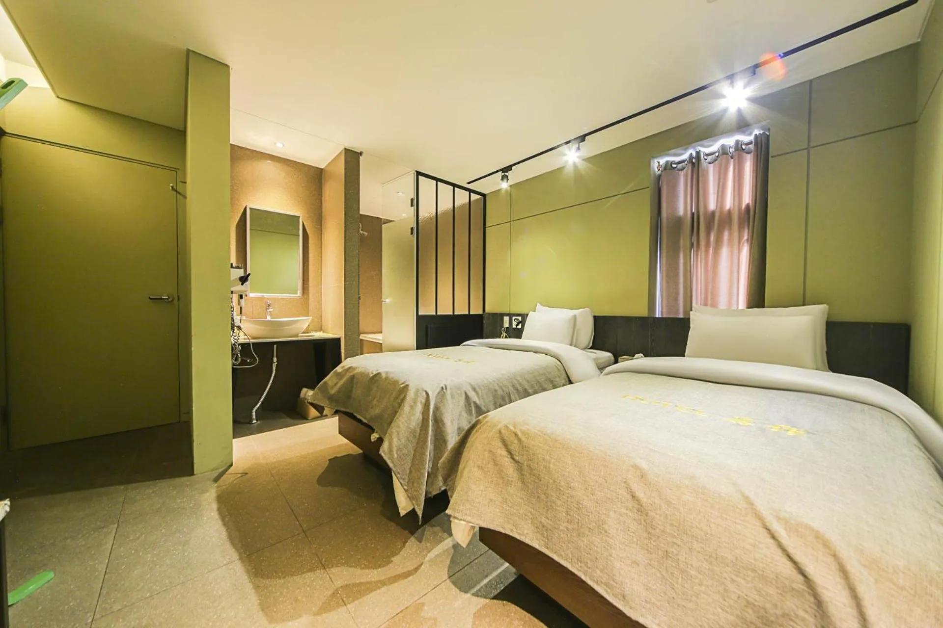 Bed in Hotel Myeongjak