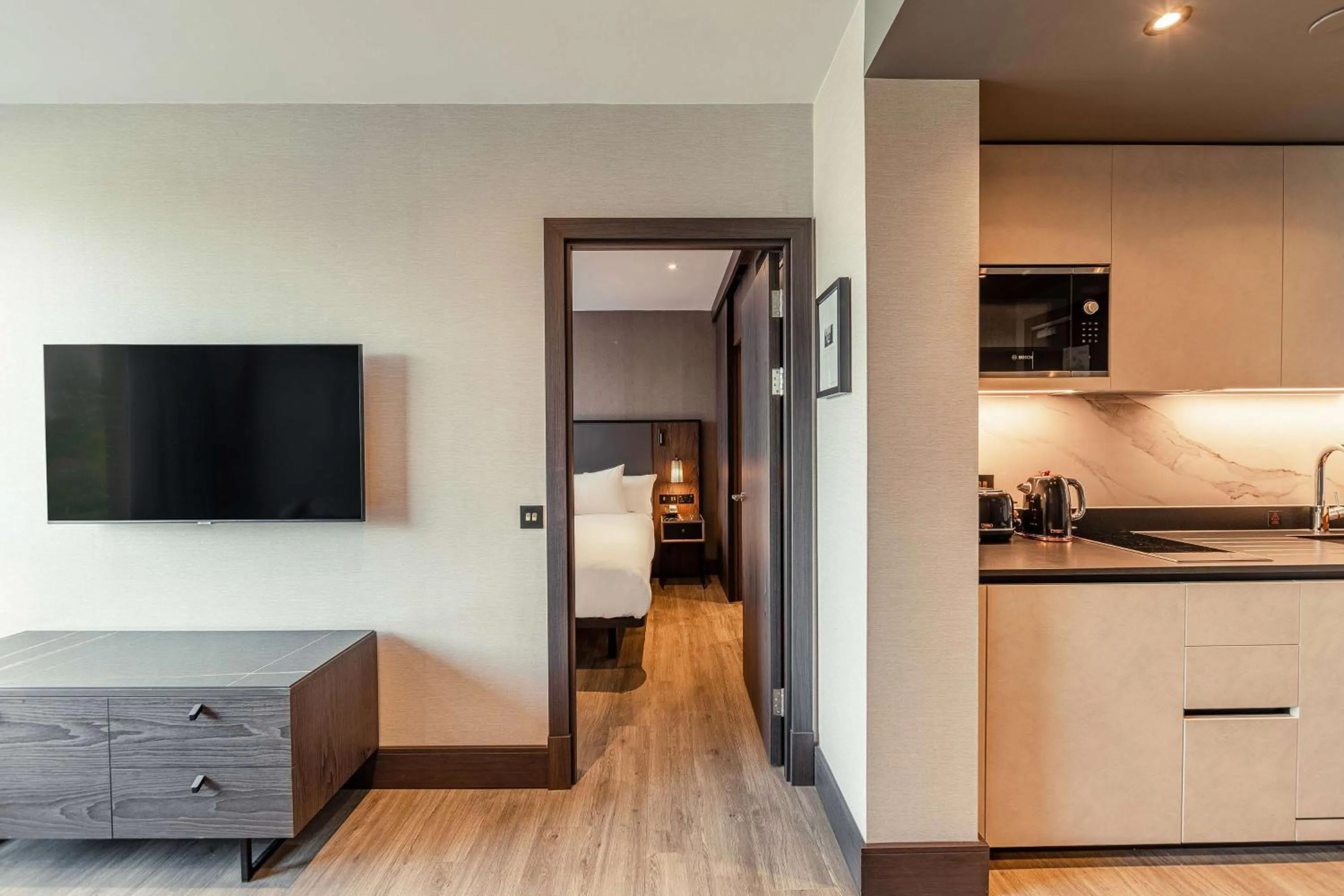 Bedroom in The Fellows House Cambridge, Curio Collection By Hilton
