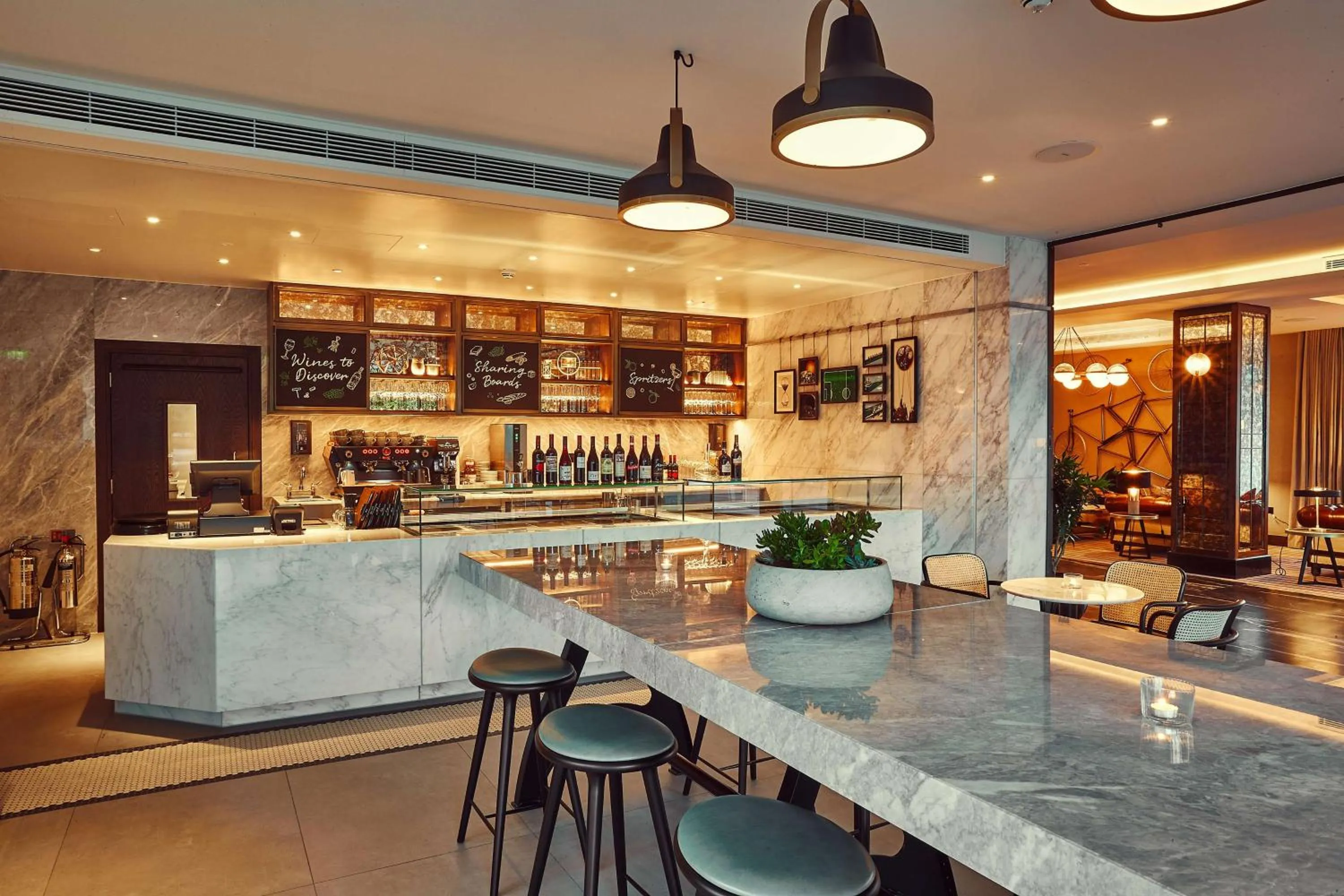 Lounge or bar in The Fellows House Cambridge, Curio Collection By Hilton