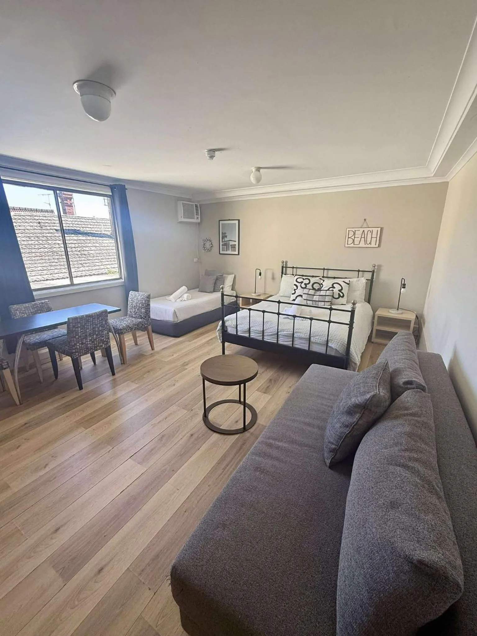 Bed in Manly Waves Studios & Apartments