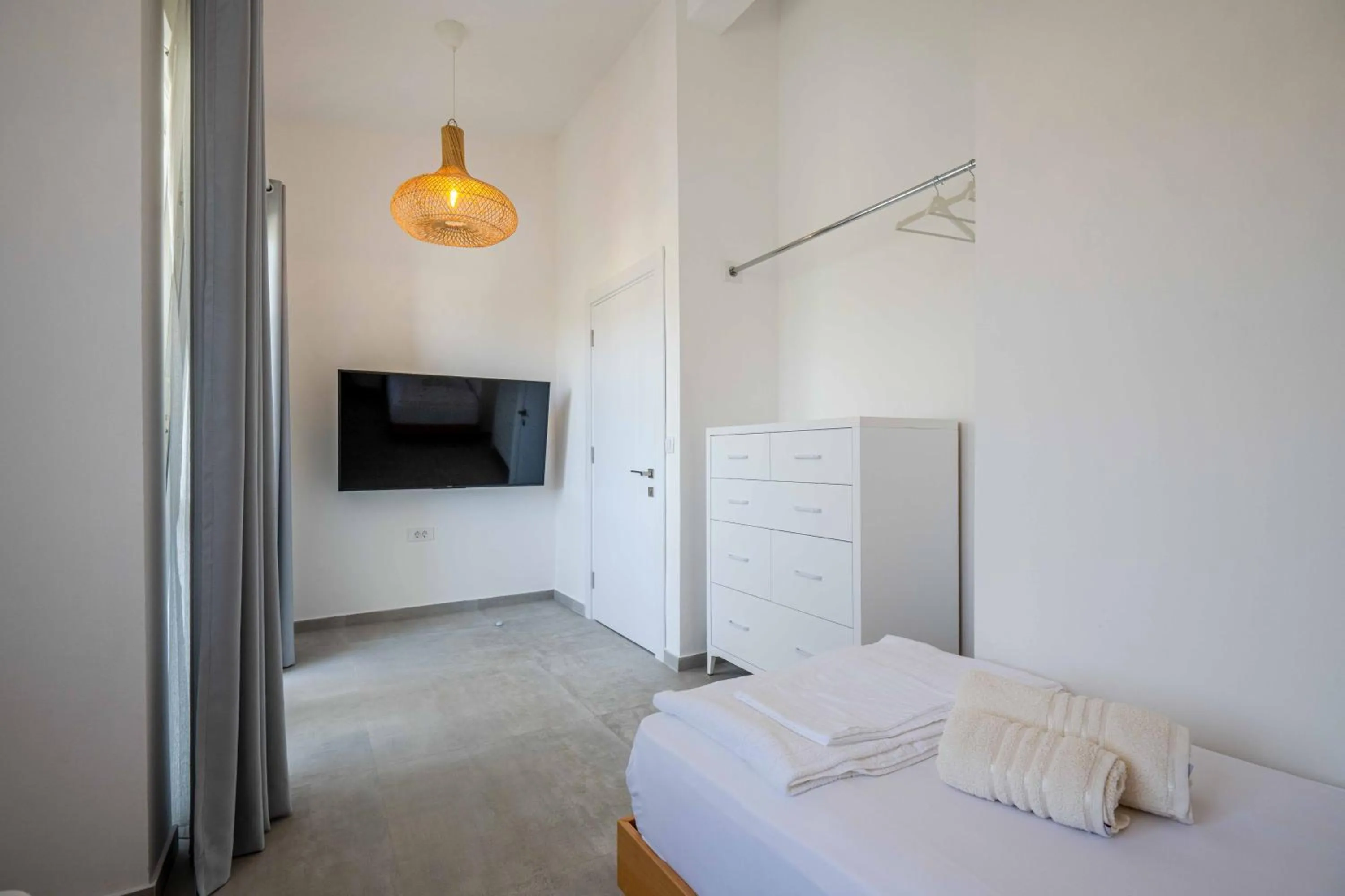 Bed in President Bungalows and Apartments