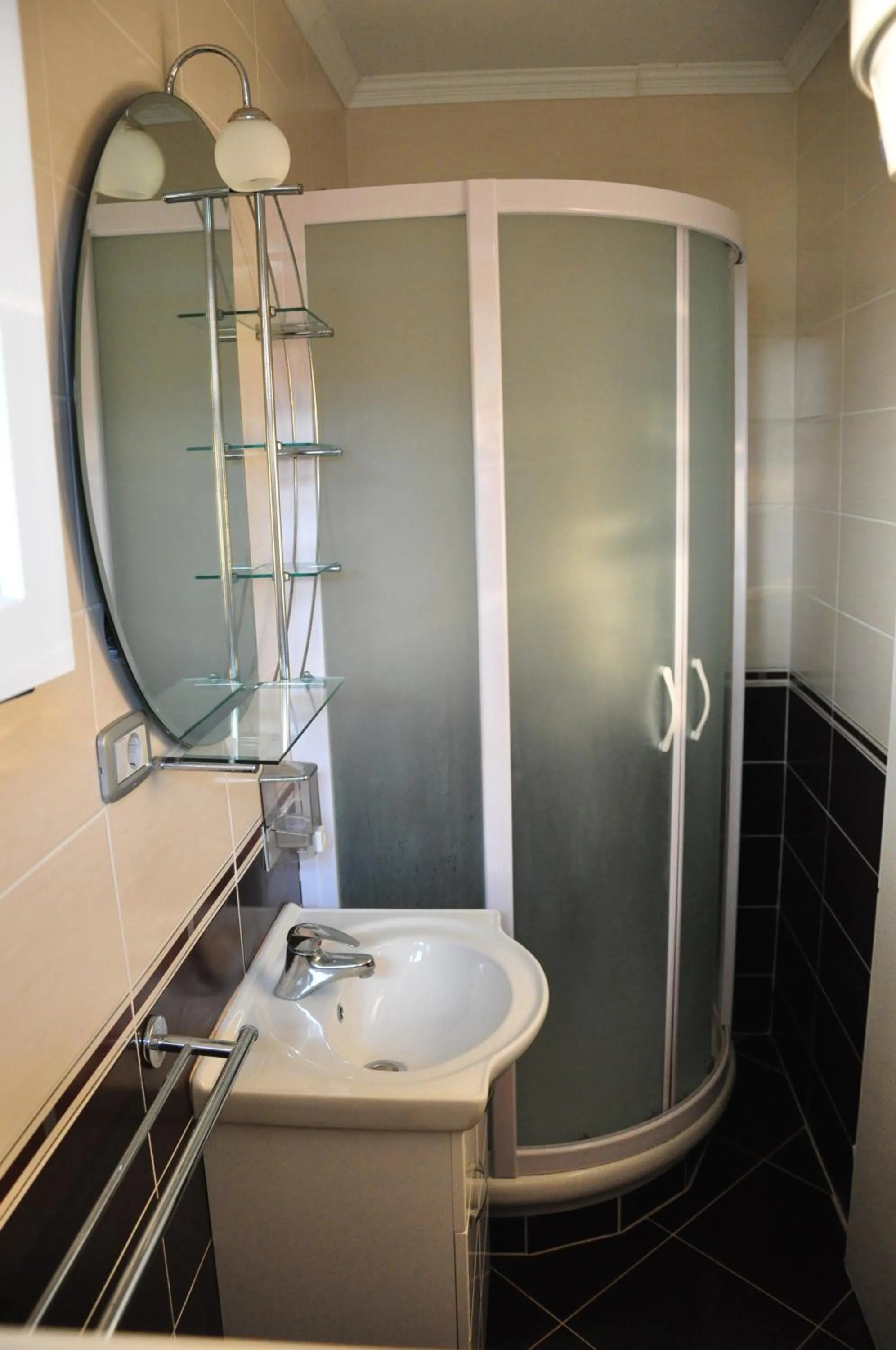 Bathroom in President Bungalows and Apartments