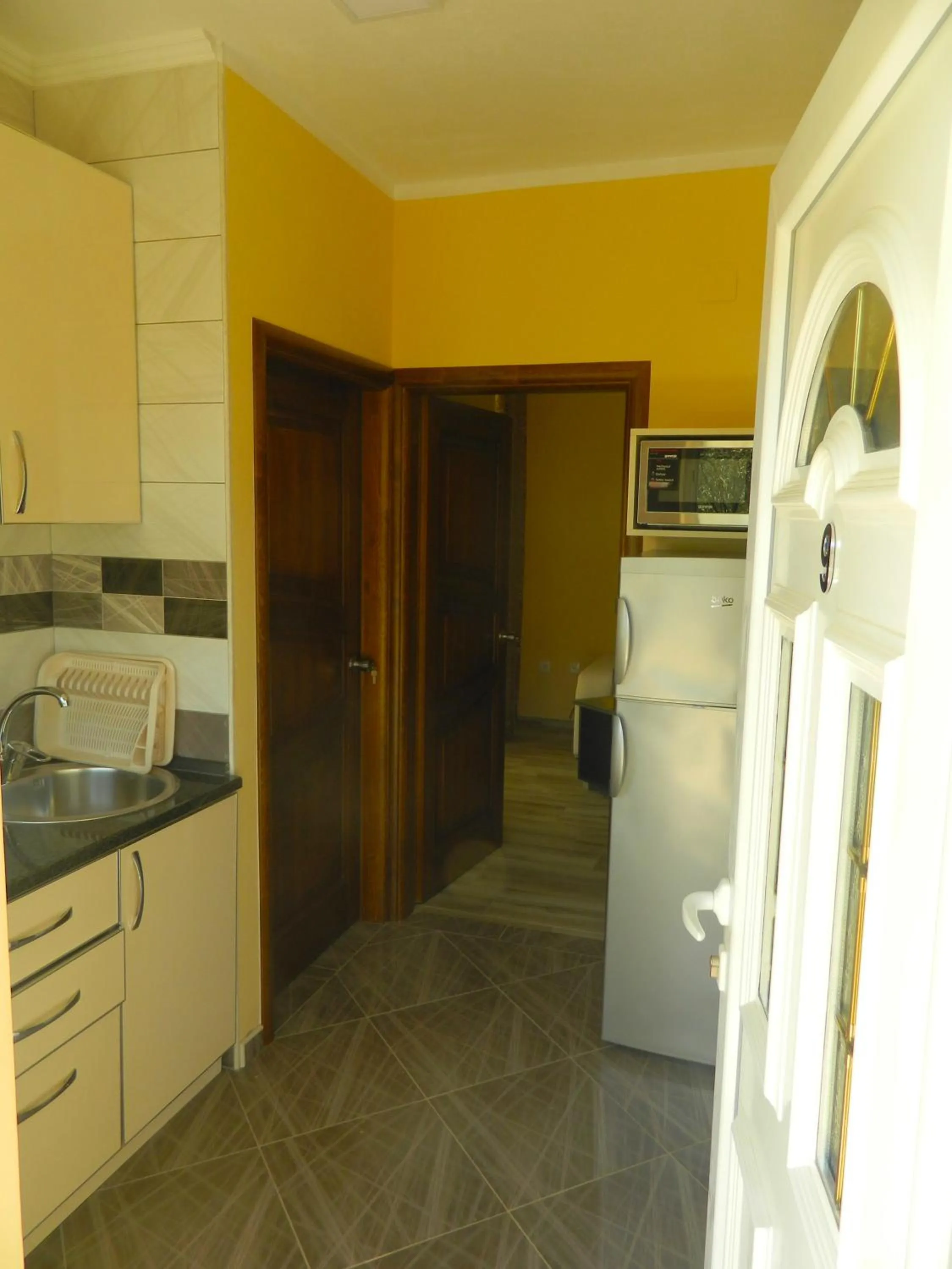 Kitchen or kitchenette in President Bungalows and Apartments