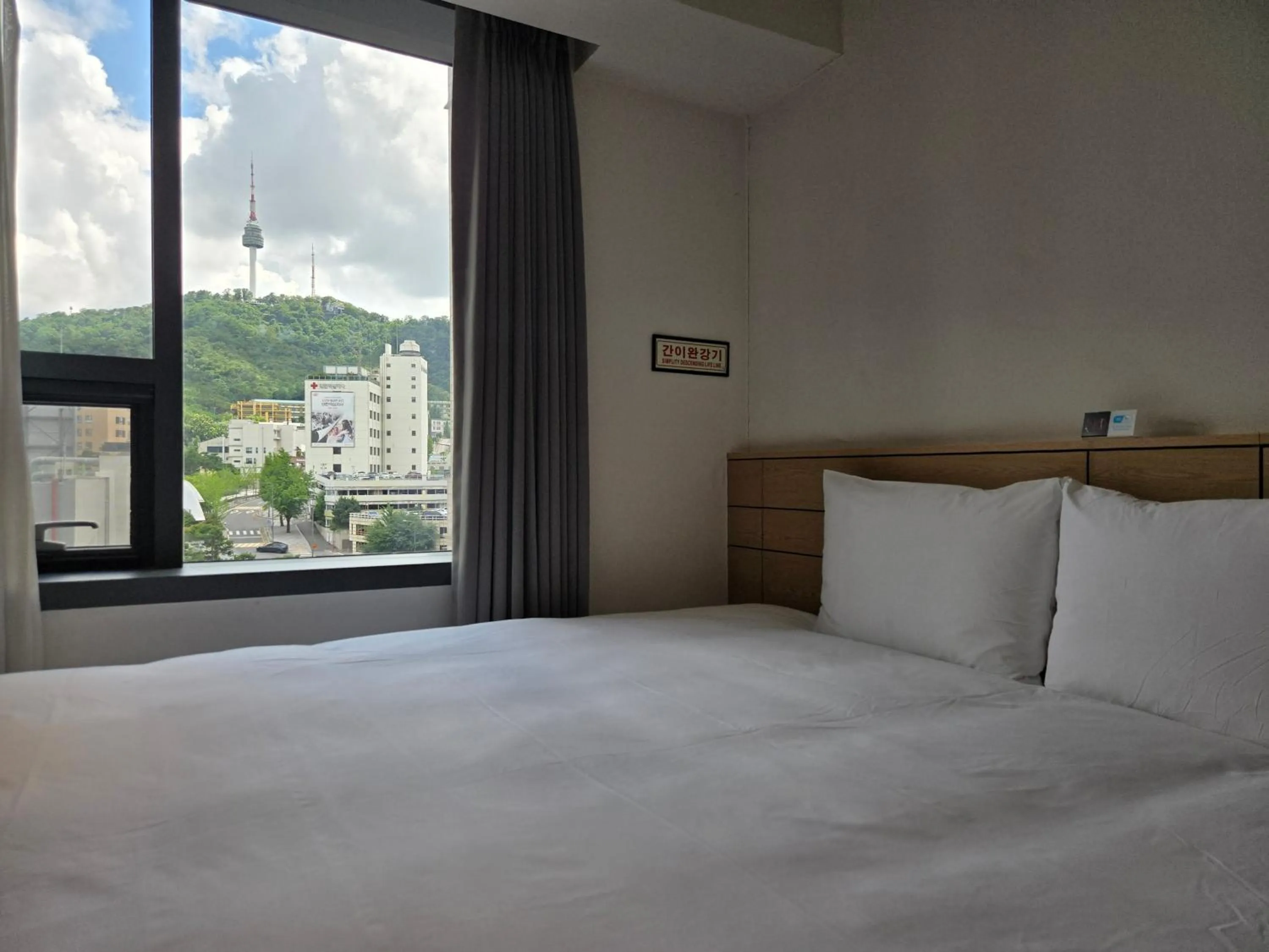 View (from property/room), Bed in Henn na Hotel Seoul Myeongdong