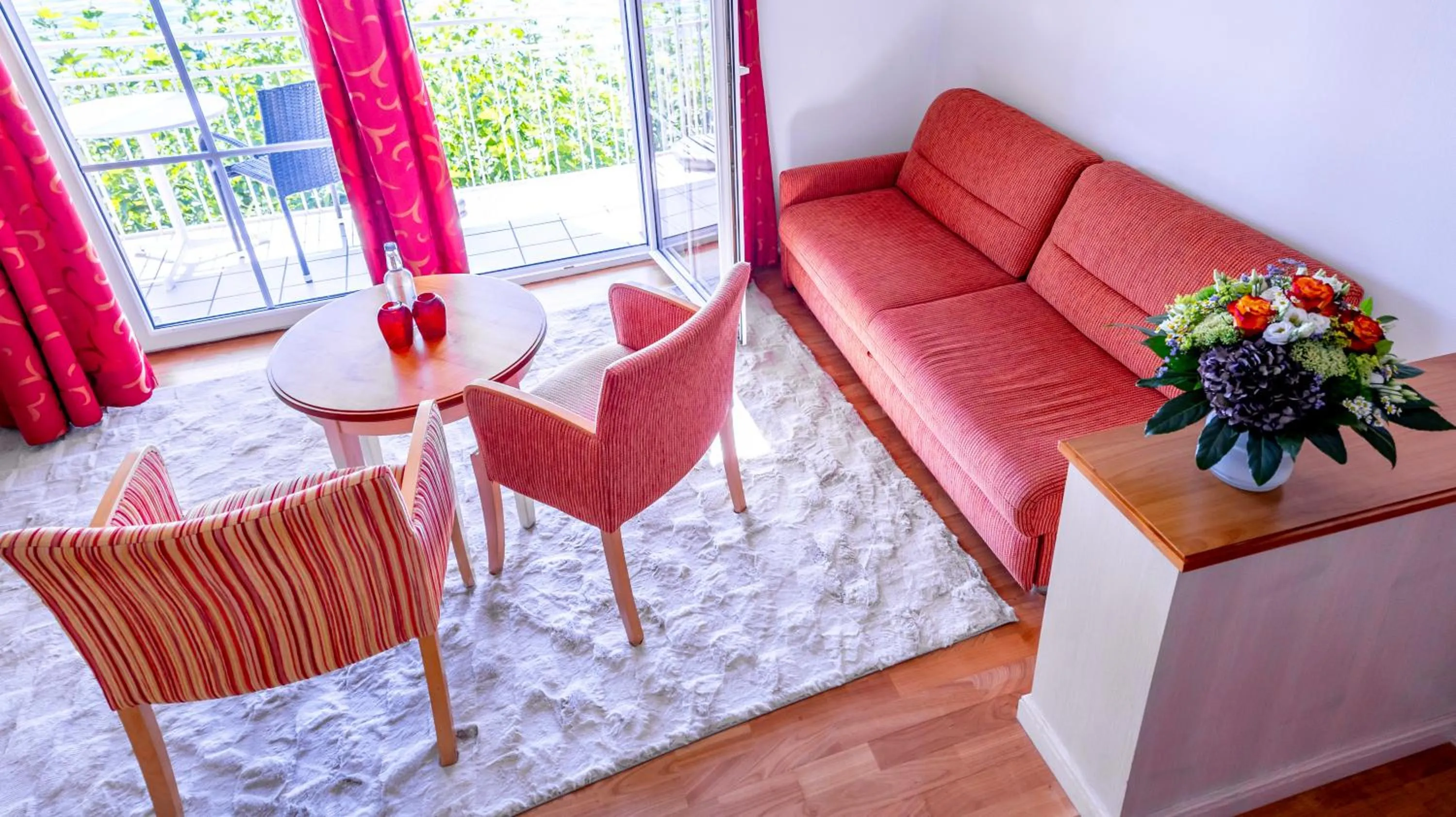 Communal lounge/ TV room in Seehotel ZUR MÜNZ