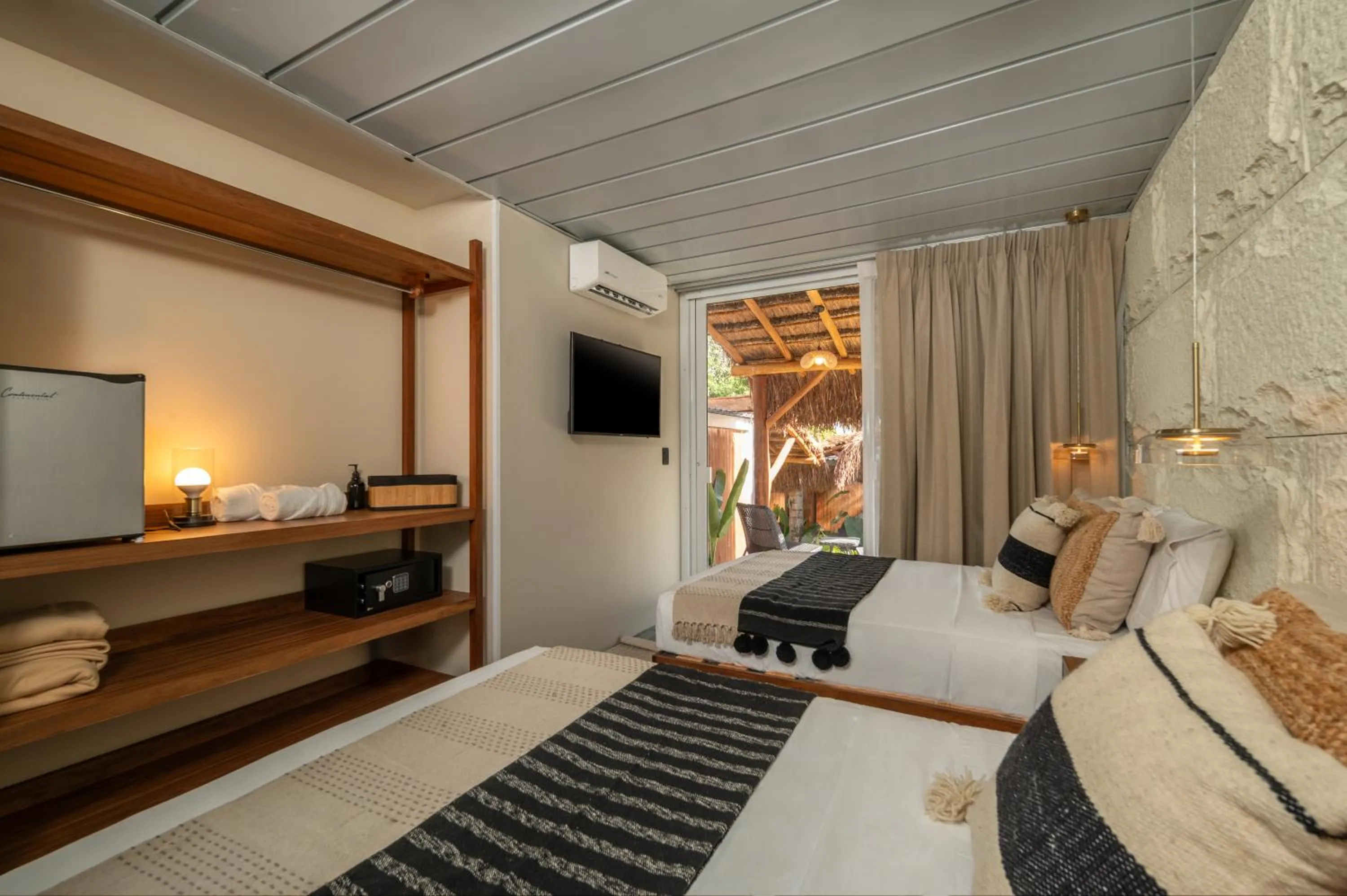 Photo of the whole room, Bed in Casa Aakal Lagoon Front
