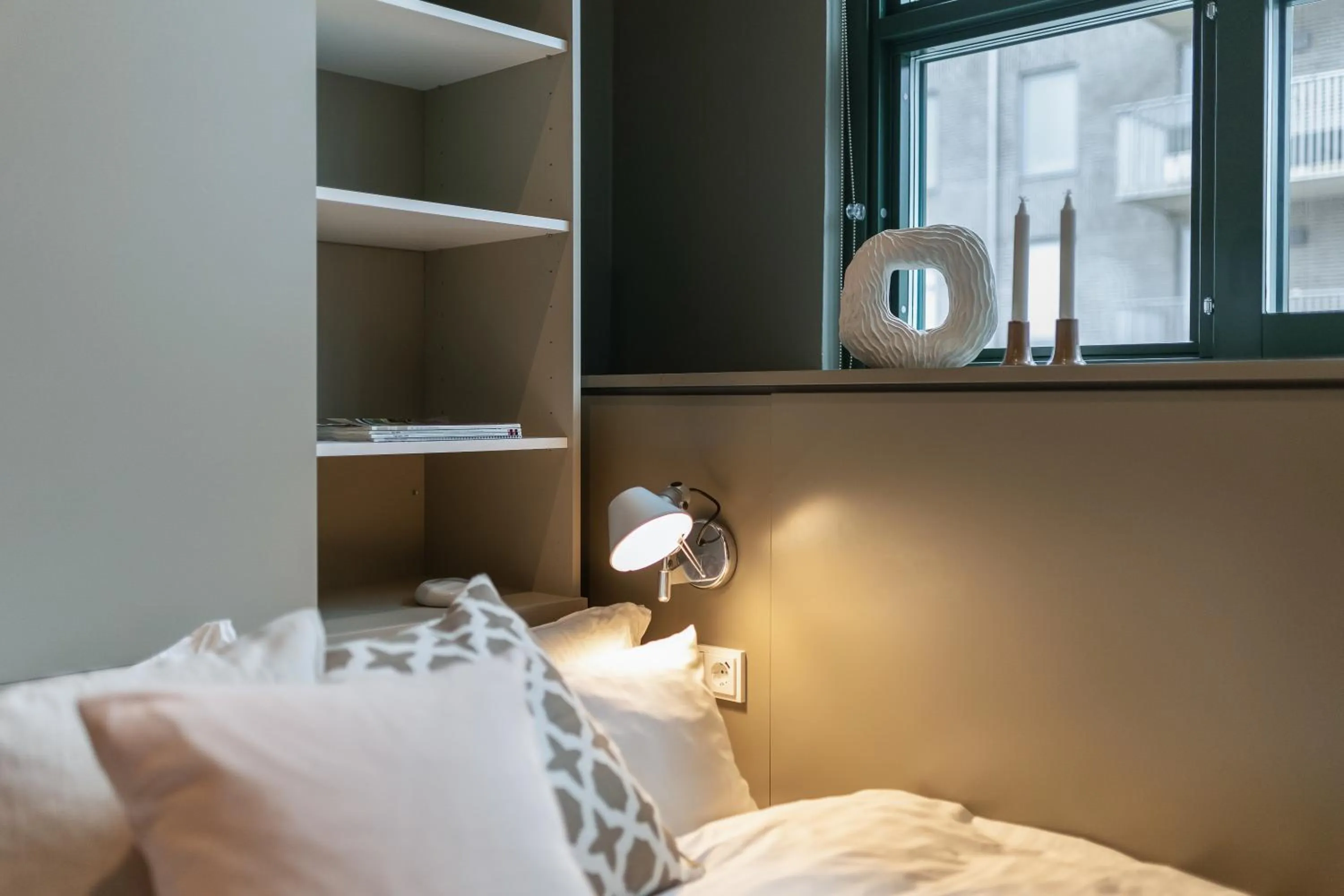 Bed in Unity Hammarby Sjöstad - A Studio Hotel