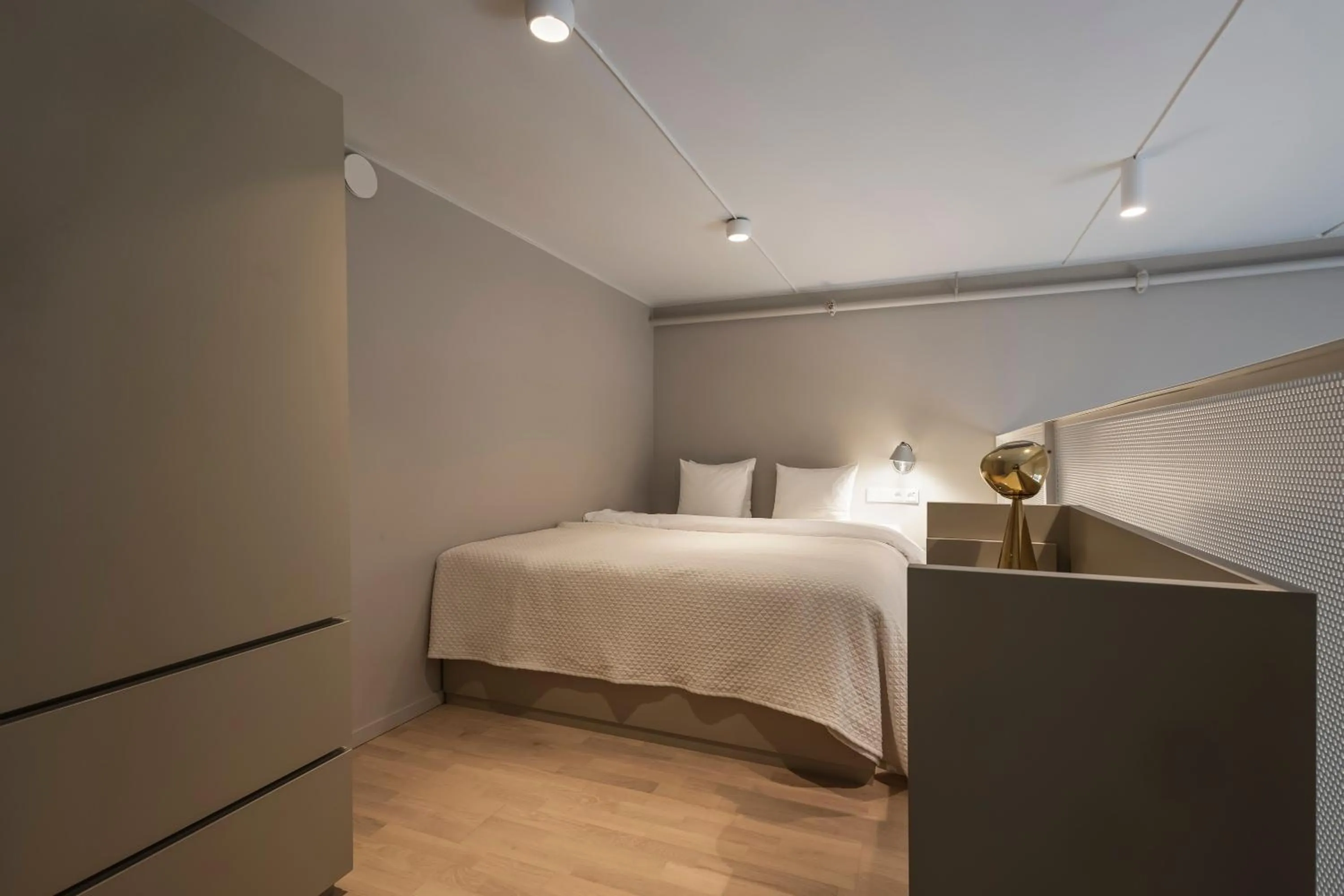 Bed in Unity Hammarby Sjöstad - A Studio Hotel