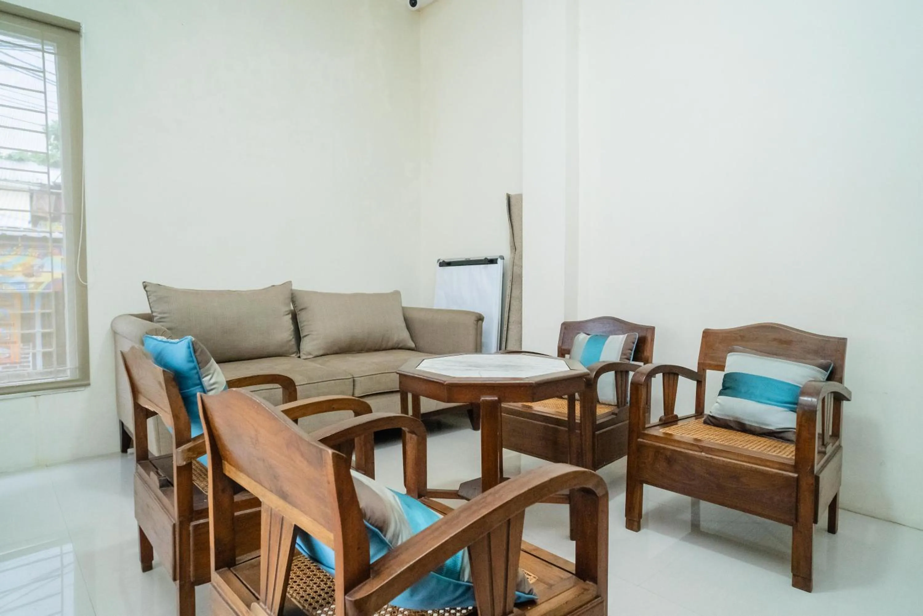 Living room in KoolKost Syariah near Jl Pajajaran Bogor