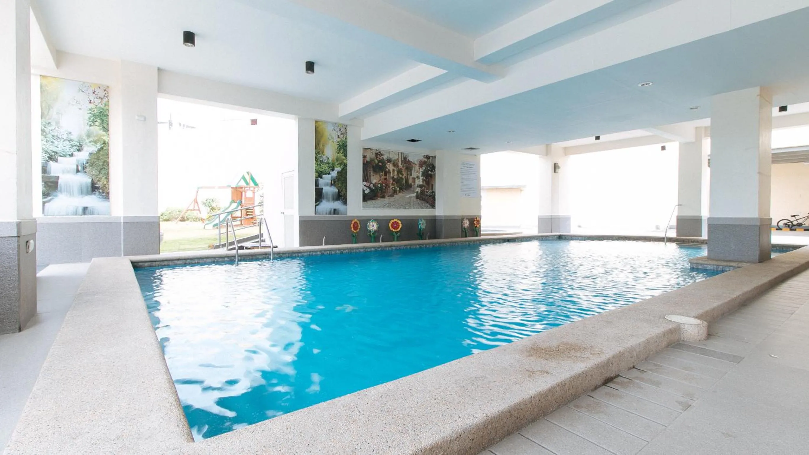 Swimming pool in RedDoorz Plus at Alpina Heights Paranaque