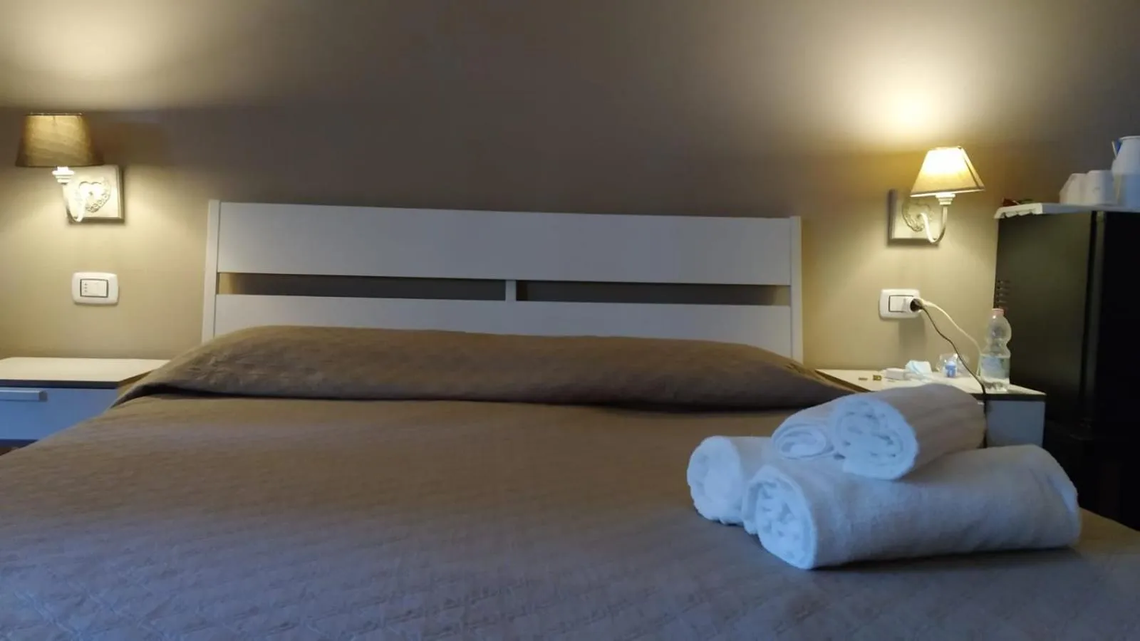 Bed in CconfortHotels R&B Cavour