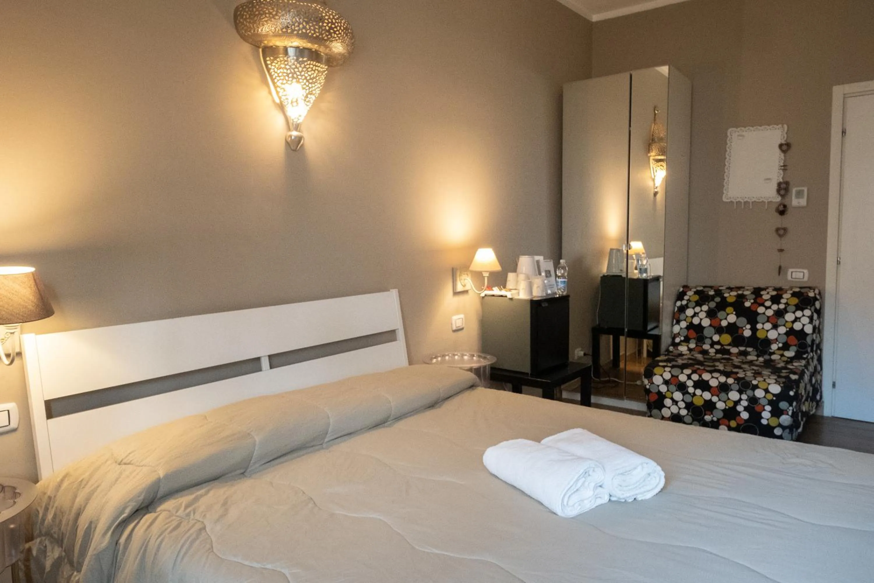 Bed in CconfortHotels R&B Cavour