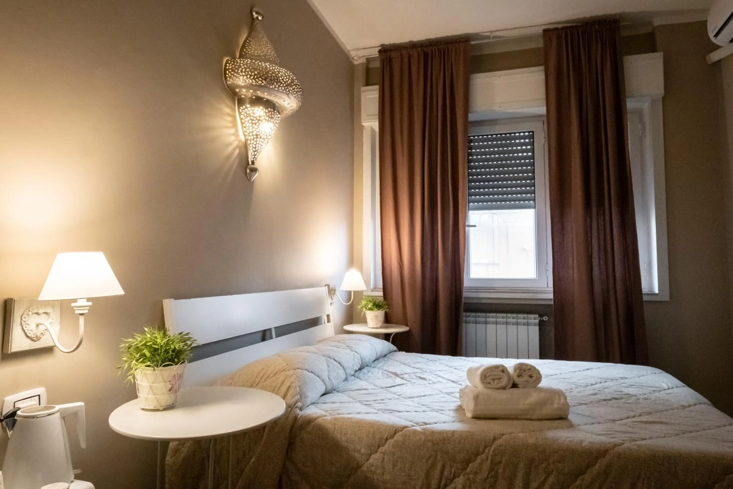 Bed in CconfortHotels R&B Cavour