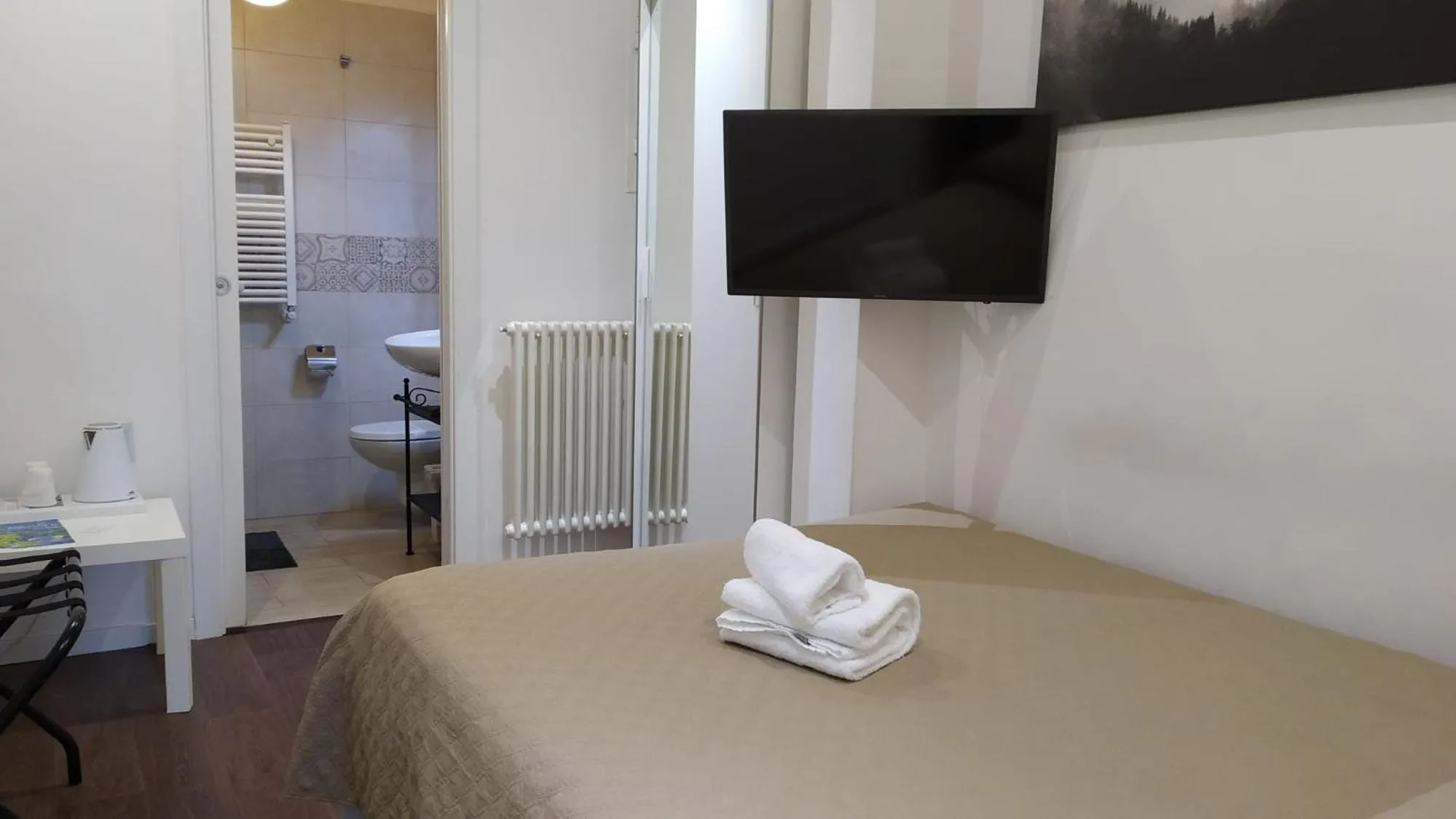 Bed in CconfortHotels Appartamento Cavour