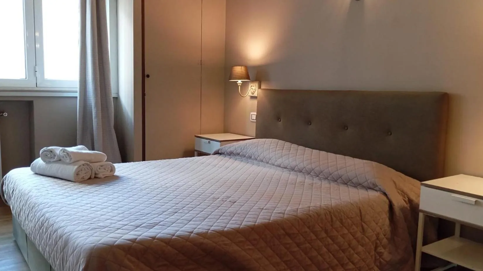 Bed in CconfortHotels R&B Cavour