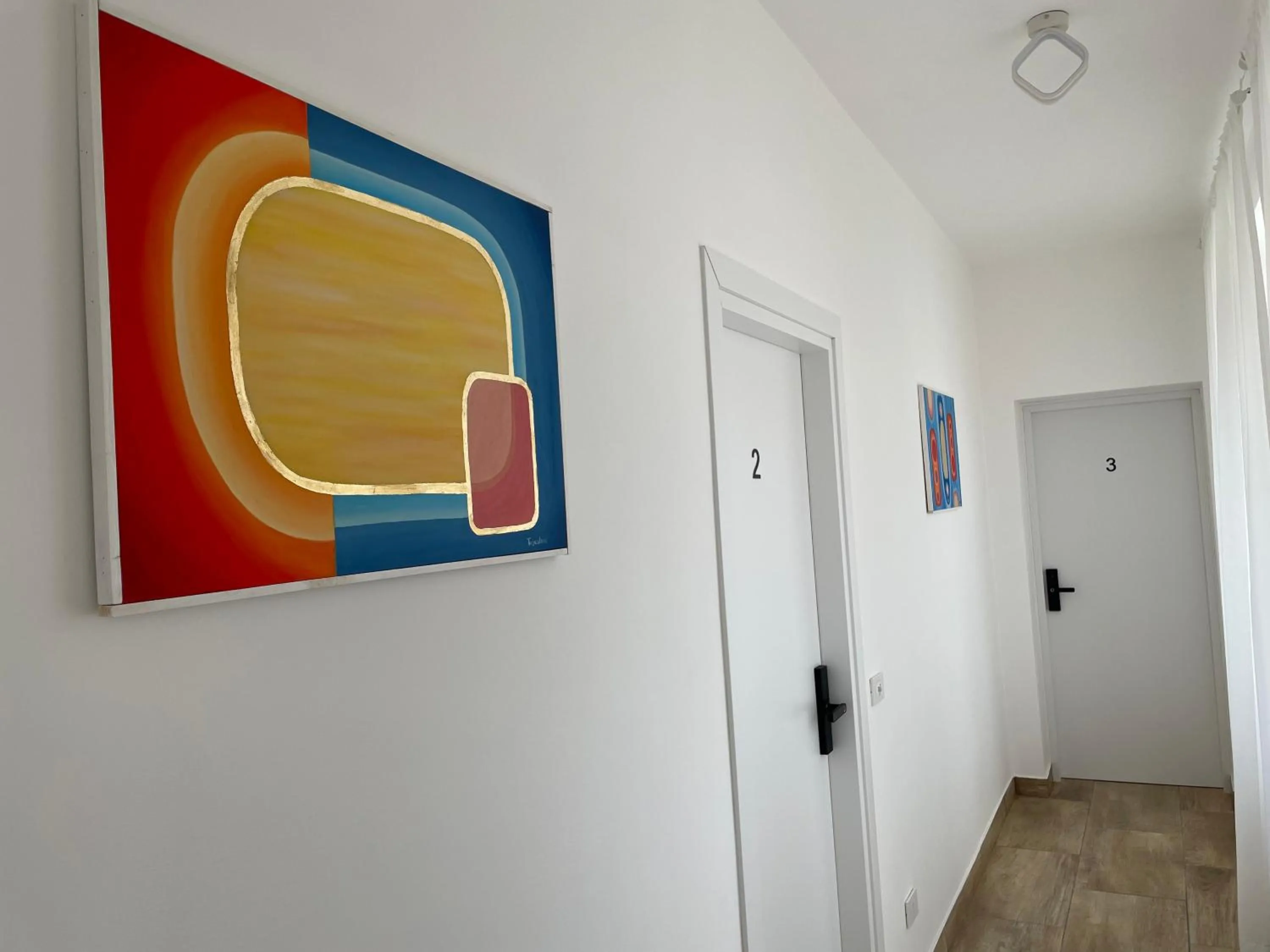 Communal lounge/ TV room in Zeta Rooms