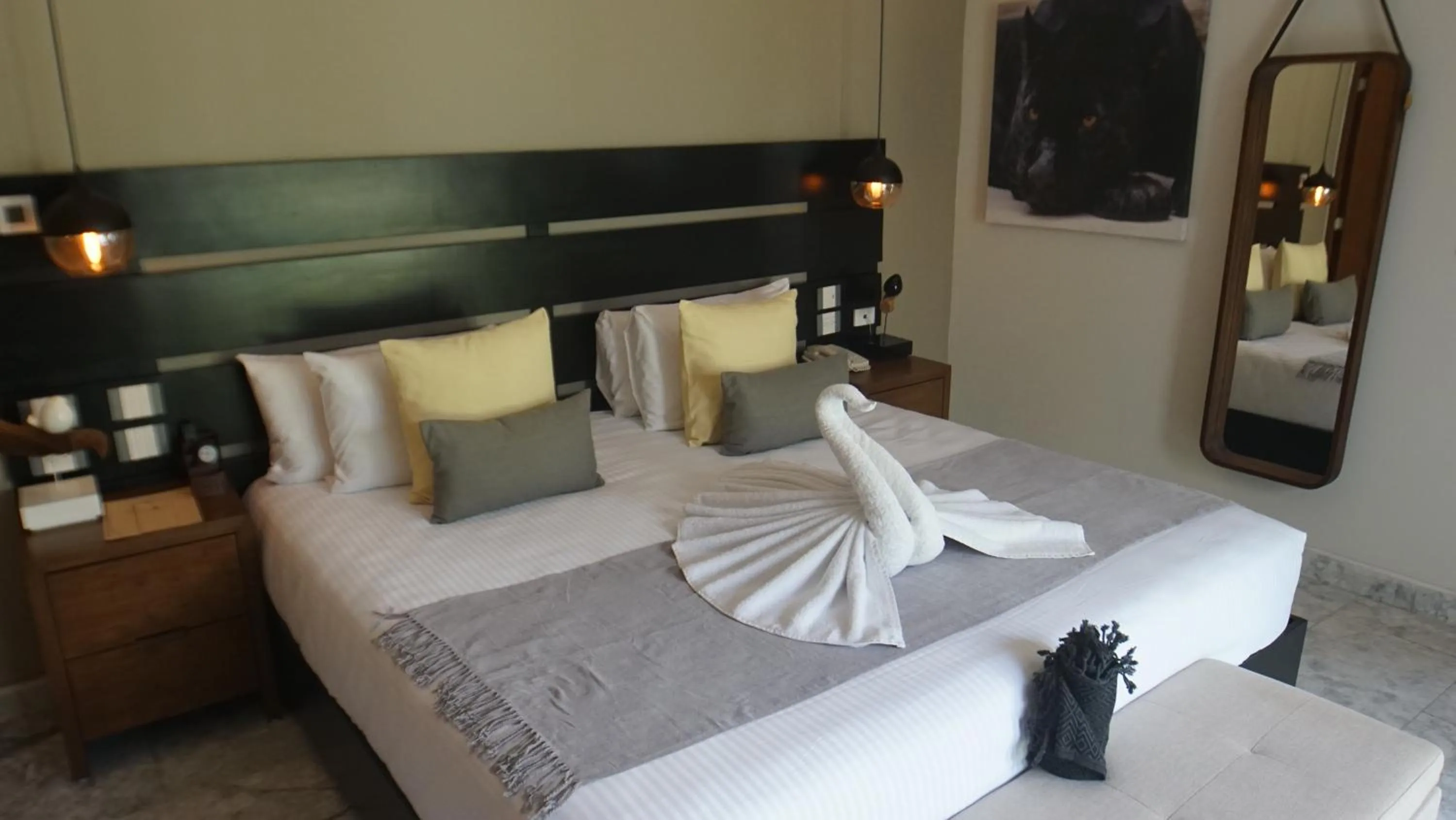 Bed in Panther Bay Boutique Hotel
