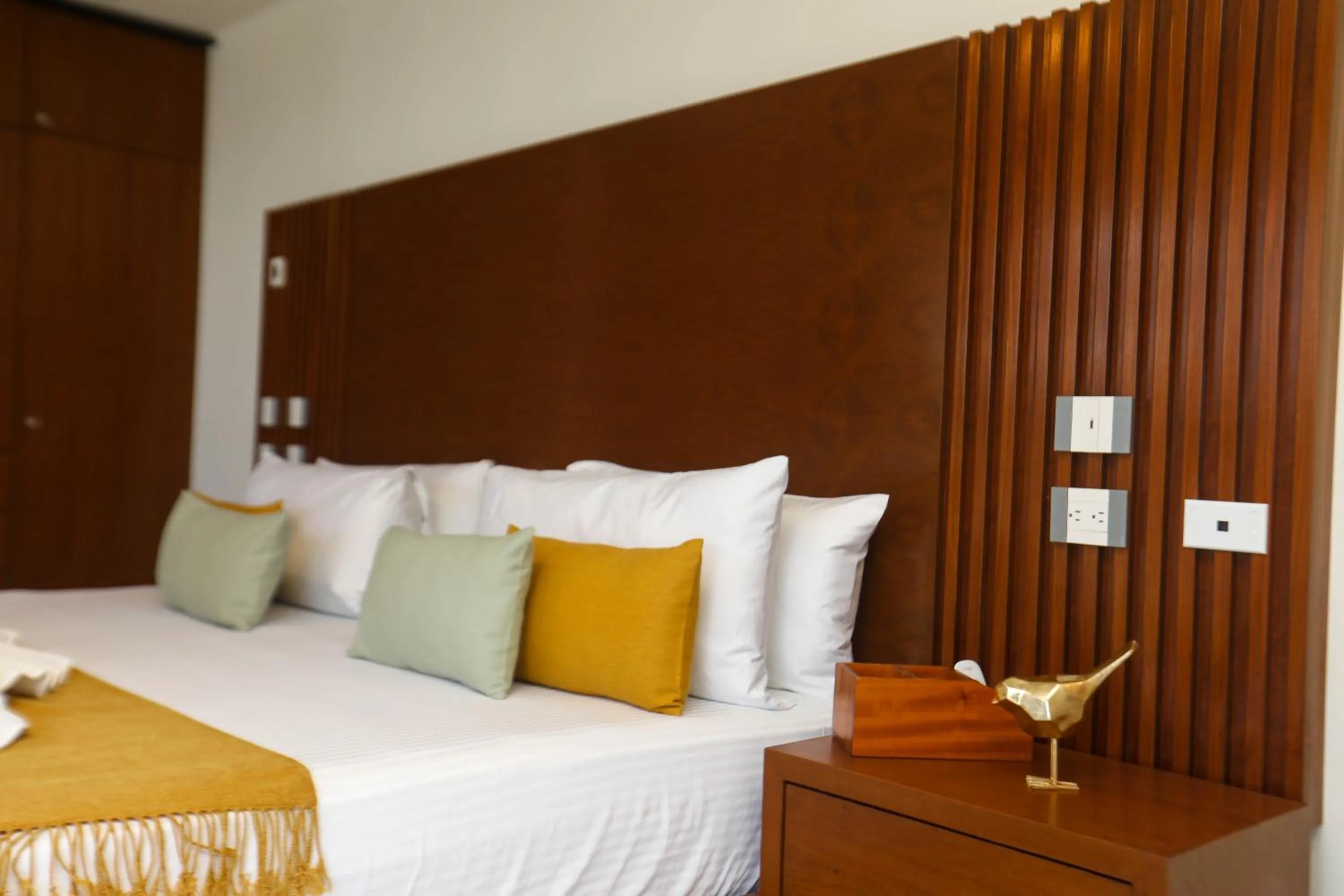 Bed in Panther Bay Boutique Hotel