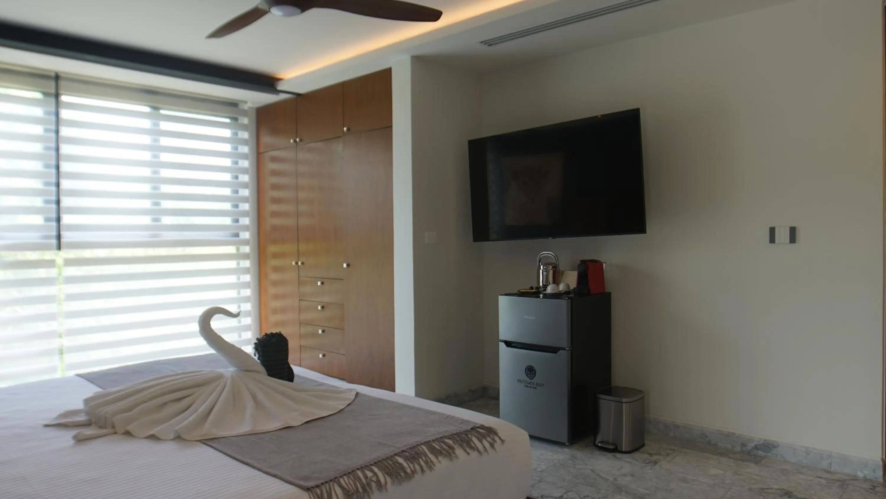 Bed in Panther Bay Boutique Hotel