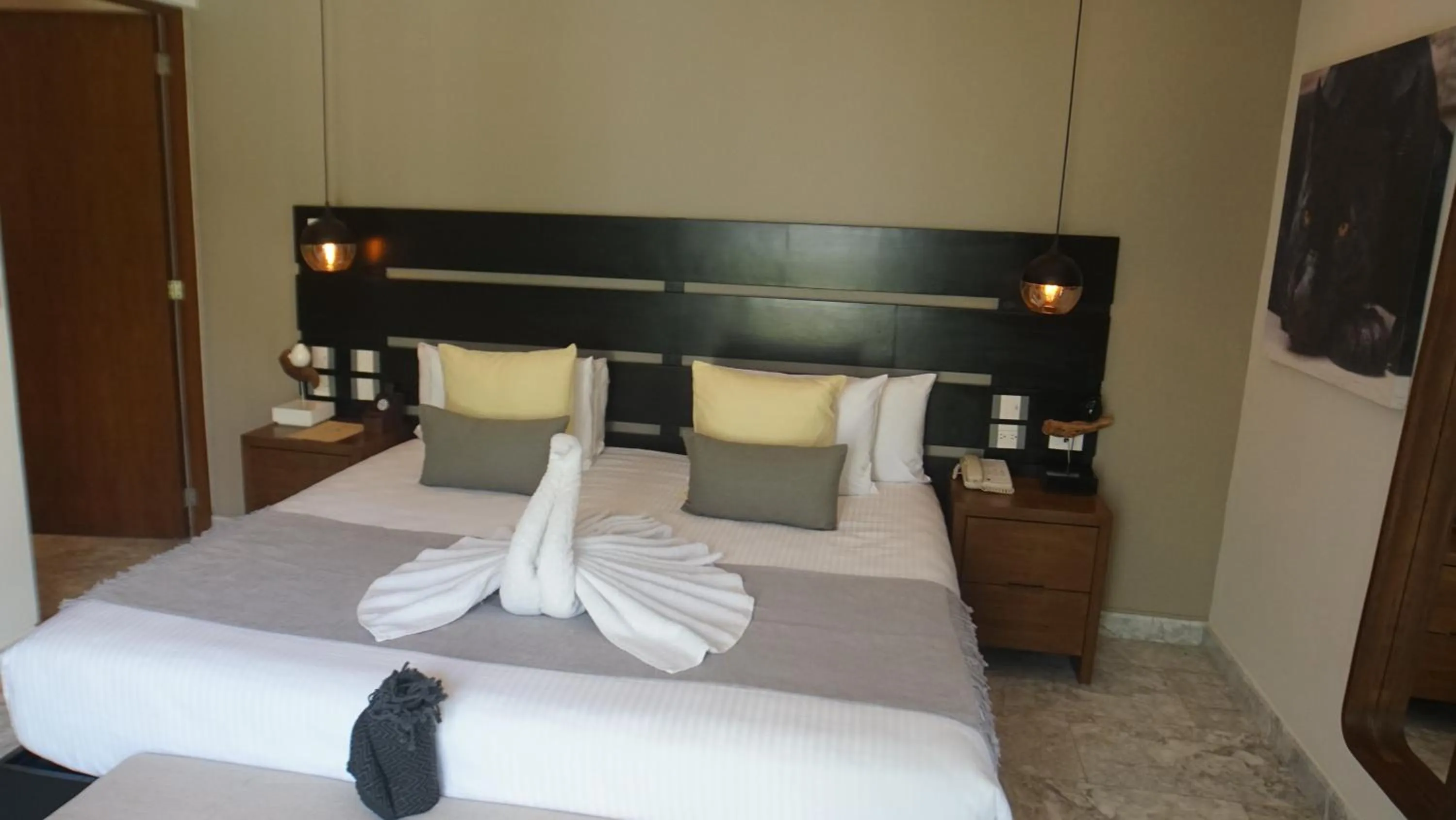 Bed in Panther Bay Boutique Hotel