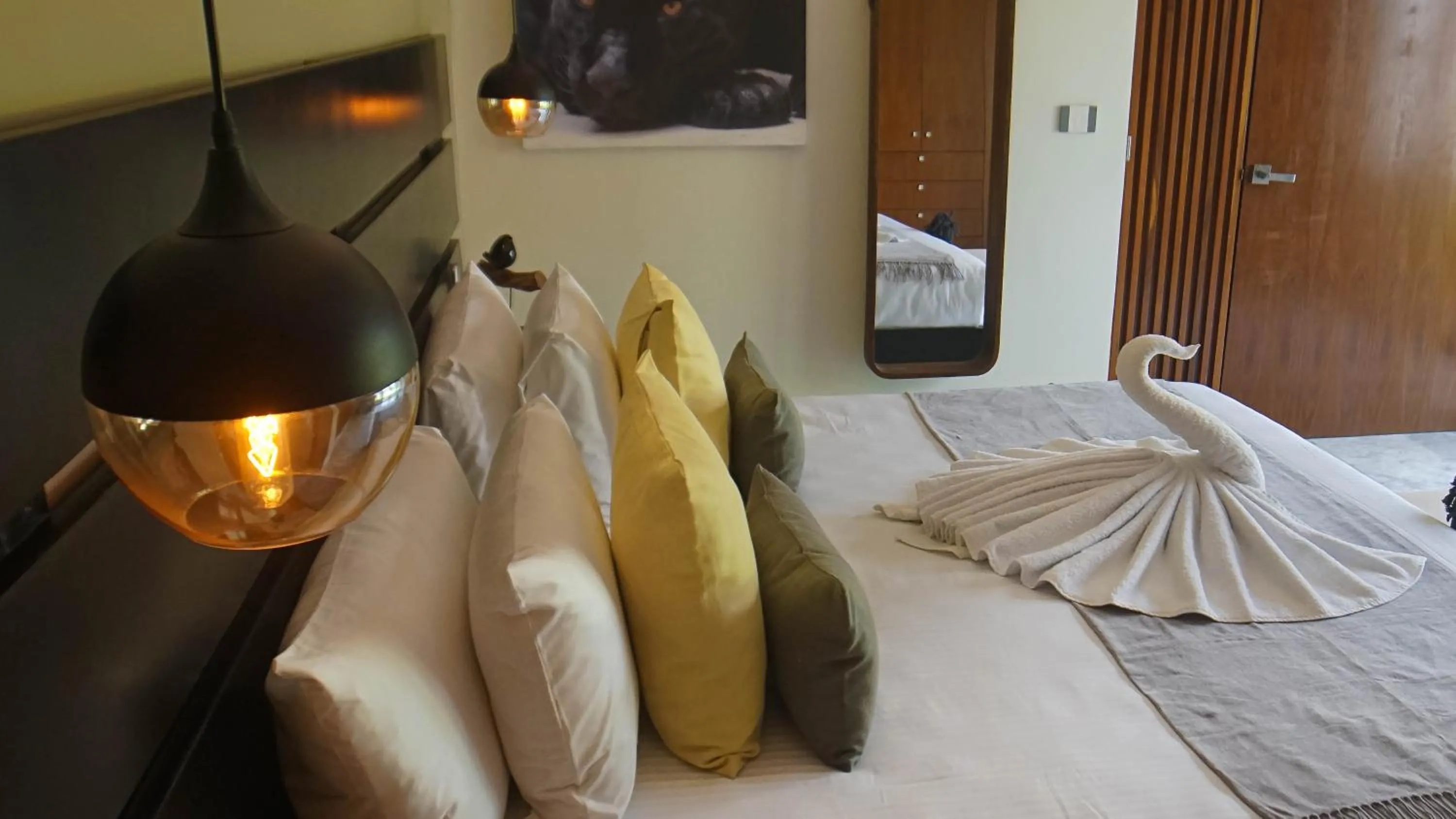 Bed in Panther Bay Boutique Hotel