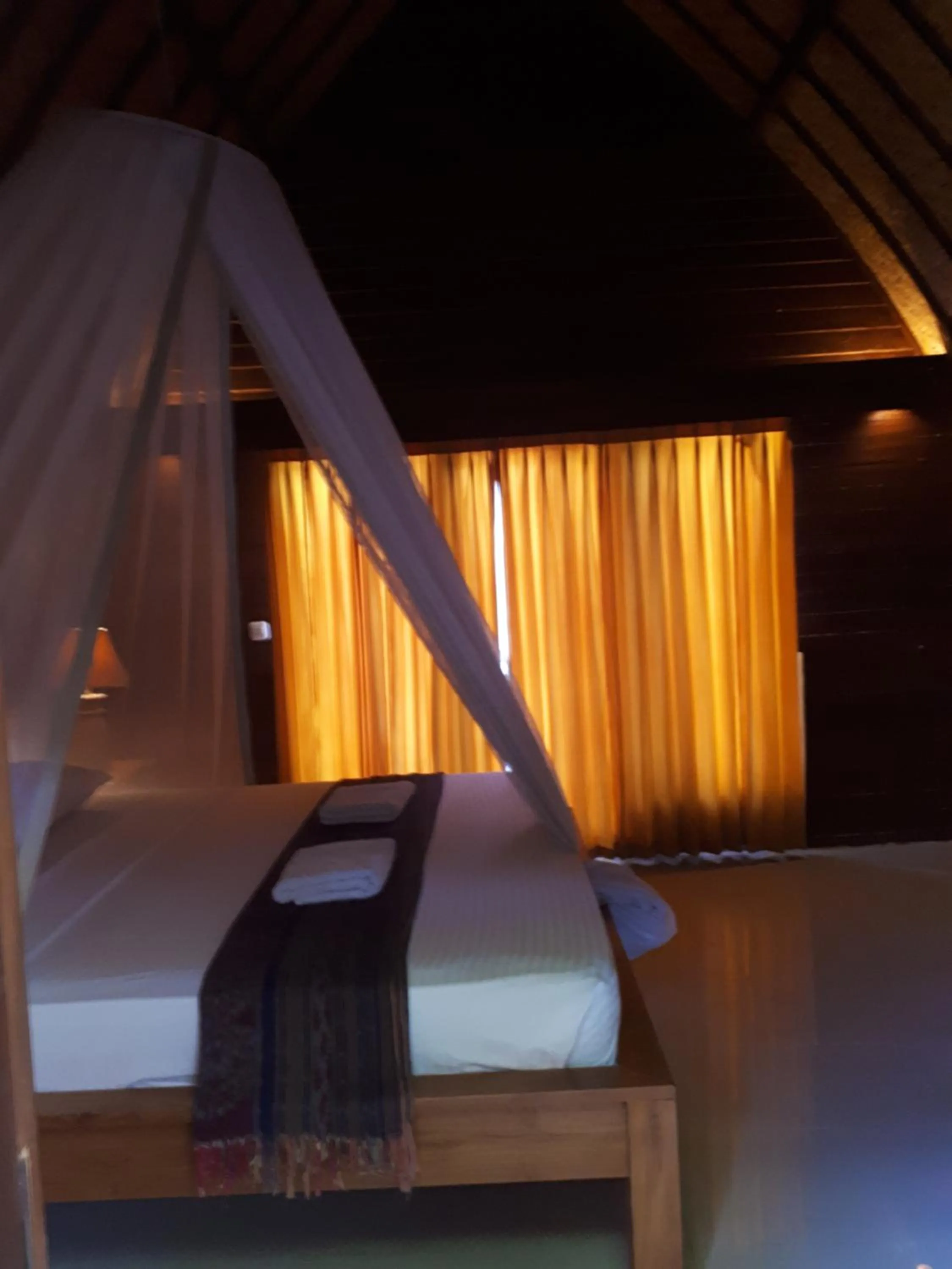 Bed in Sandy Beach Bungalows