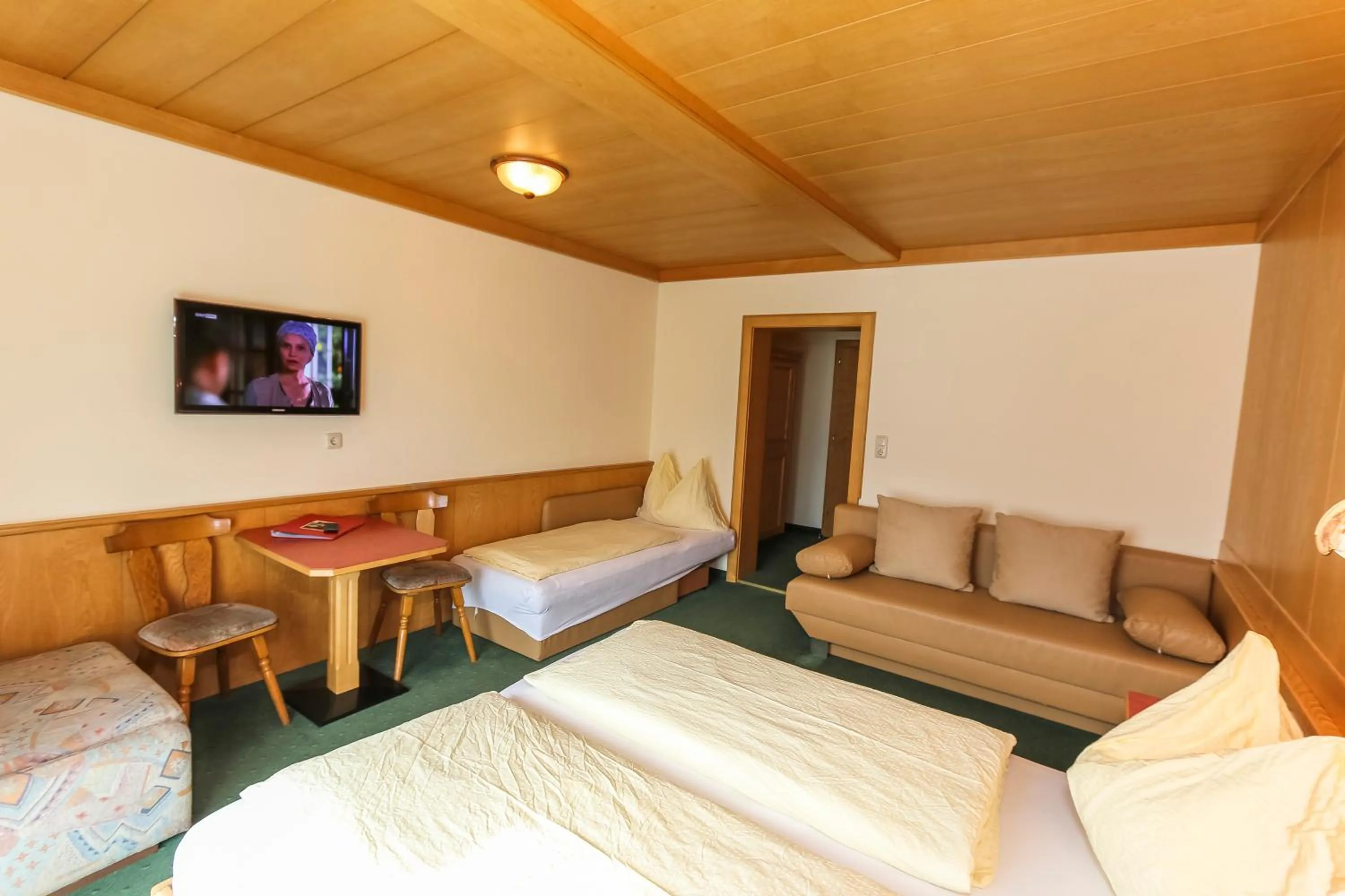 Photo of the whole room, Bed in Alpenhotel Tauernstüberl