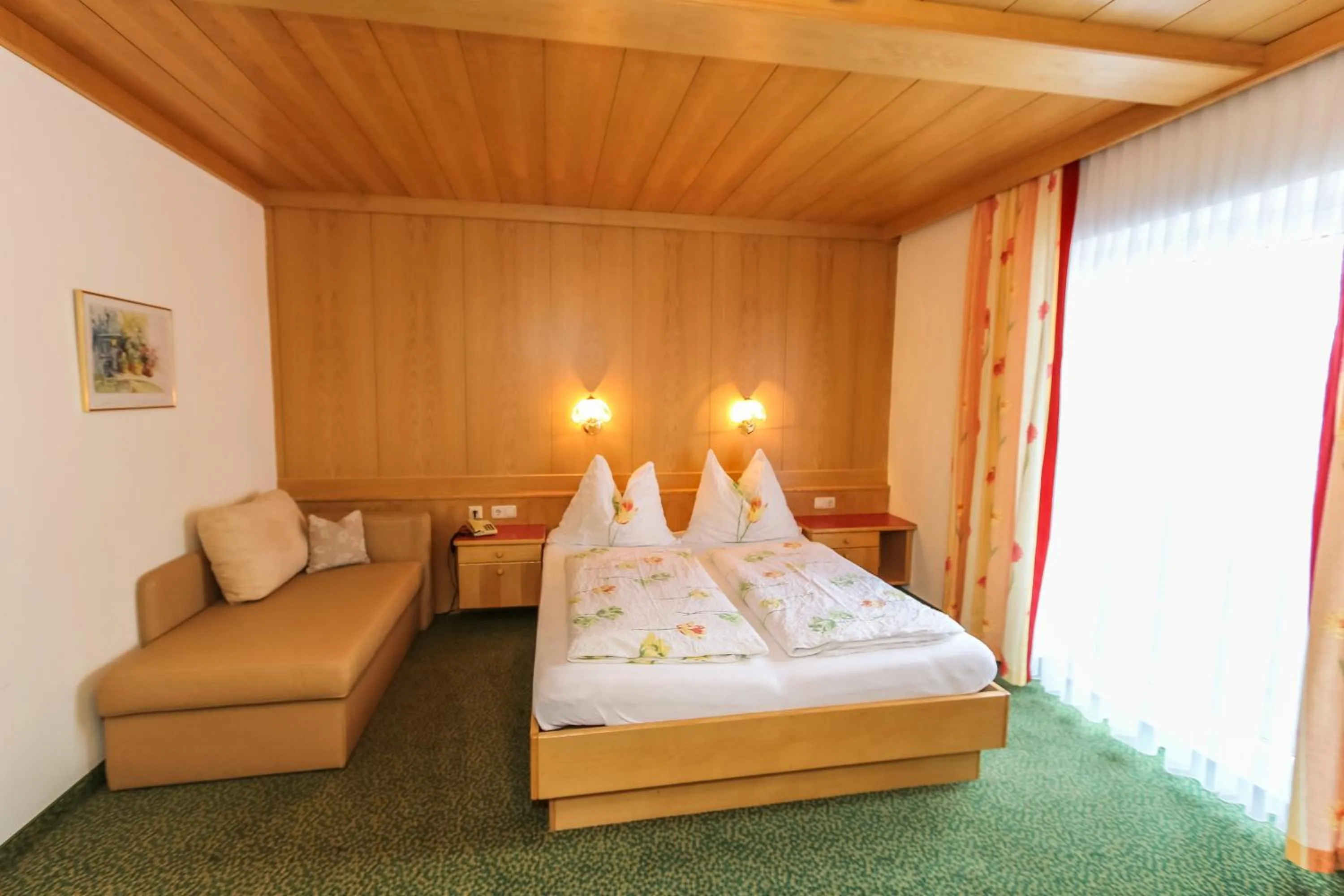 Photo of the whole room, Bed in Alpenhotel Tauernstüberl