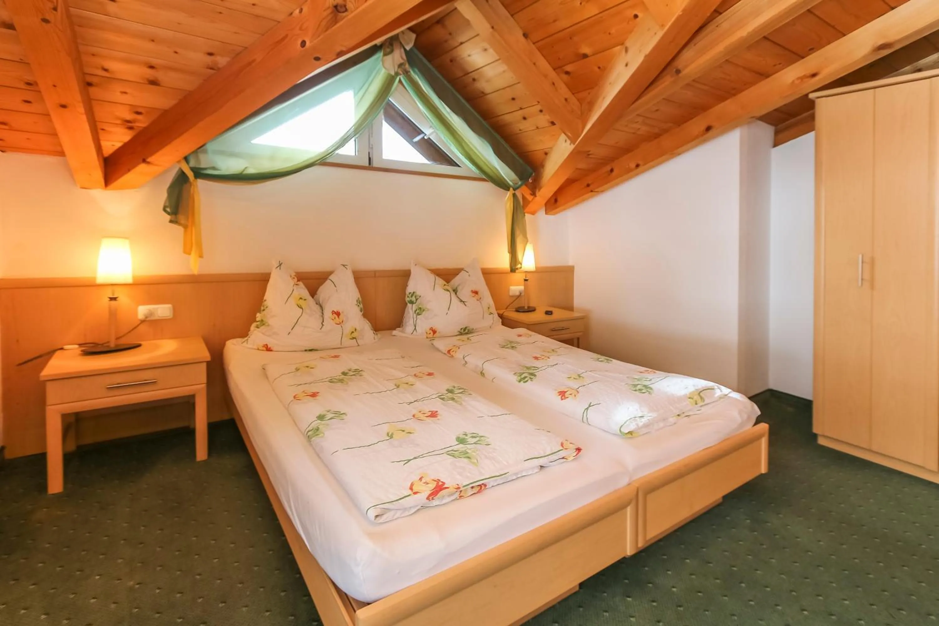 Photo of the whole room, Bed in Alpenhotel Tauernstüberl