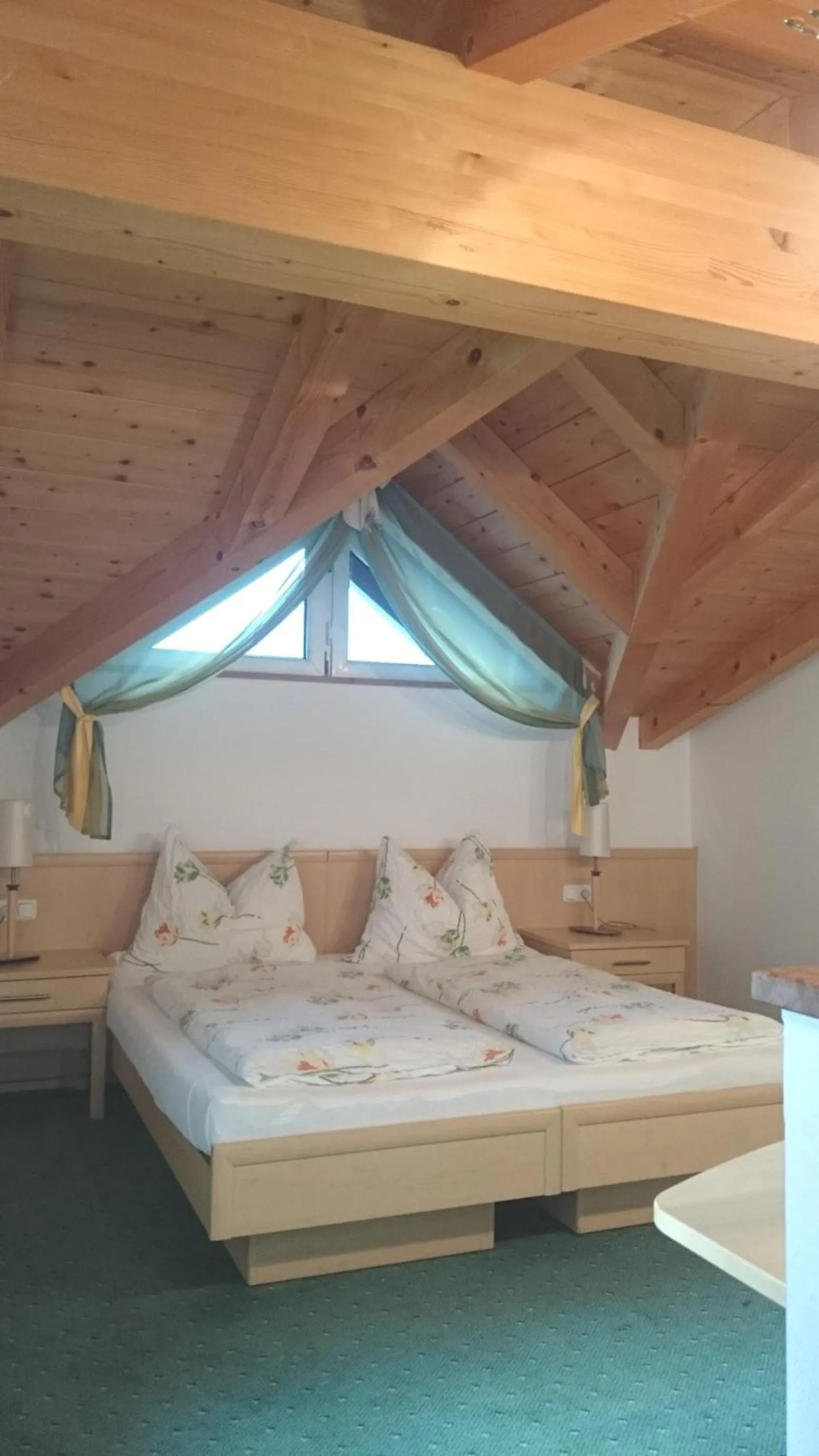 Bed in Alpenhotel Tauernstüberl