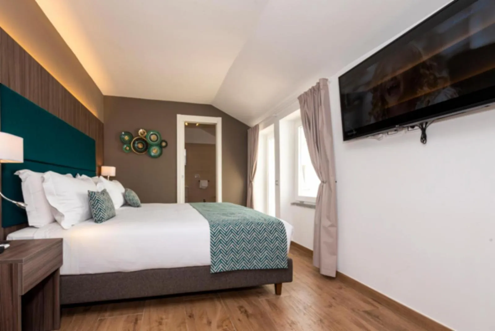 Bed in Aurelia Antica Suites & Apartments