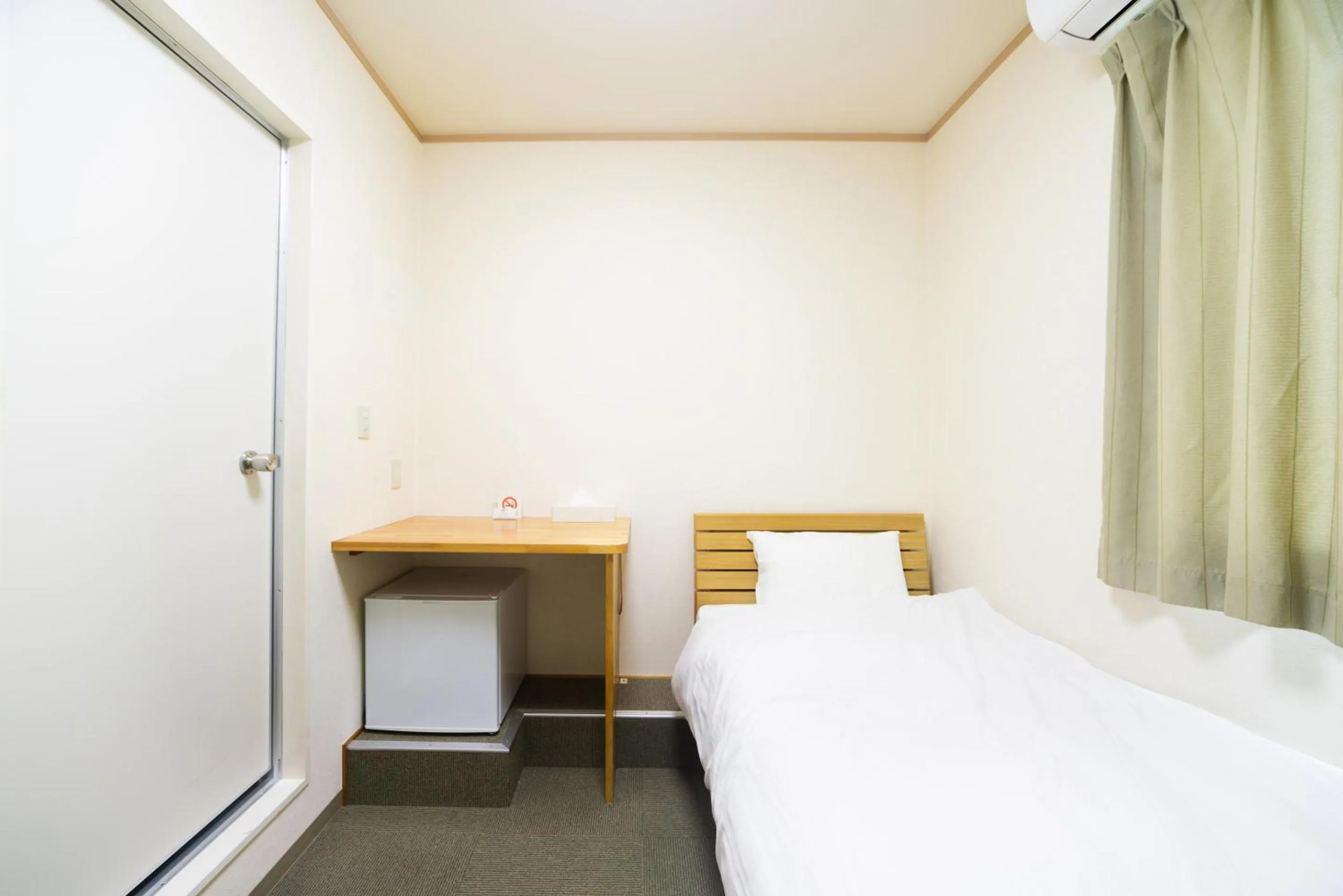 Bed in Tabist Hotel Daimu Minami-Souma