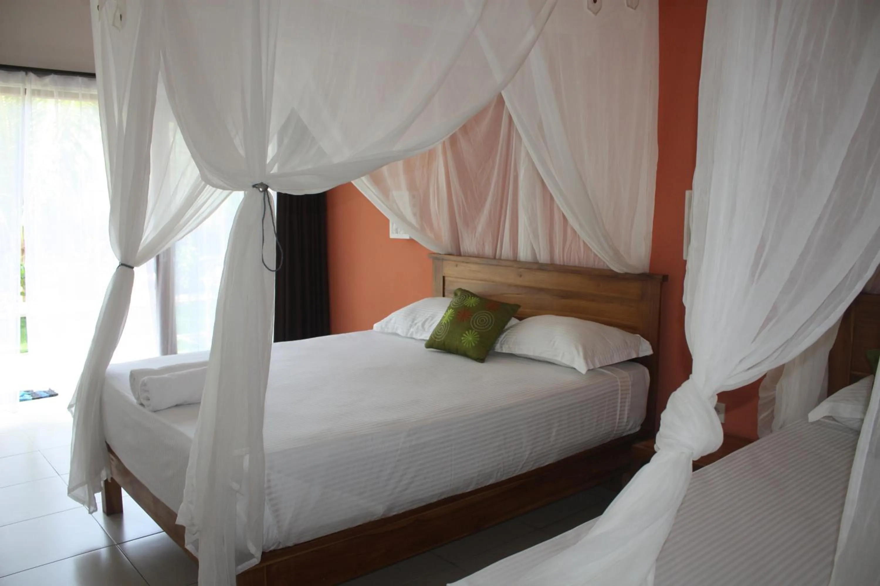 Bed in Arjuna Homestay