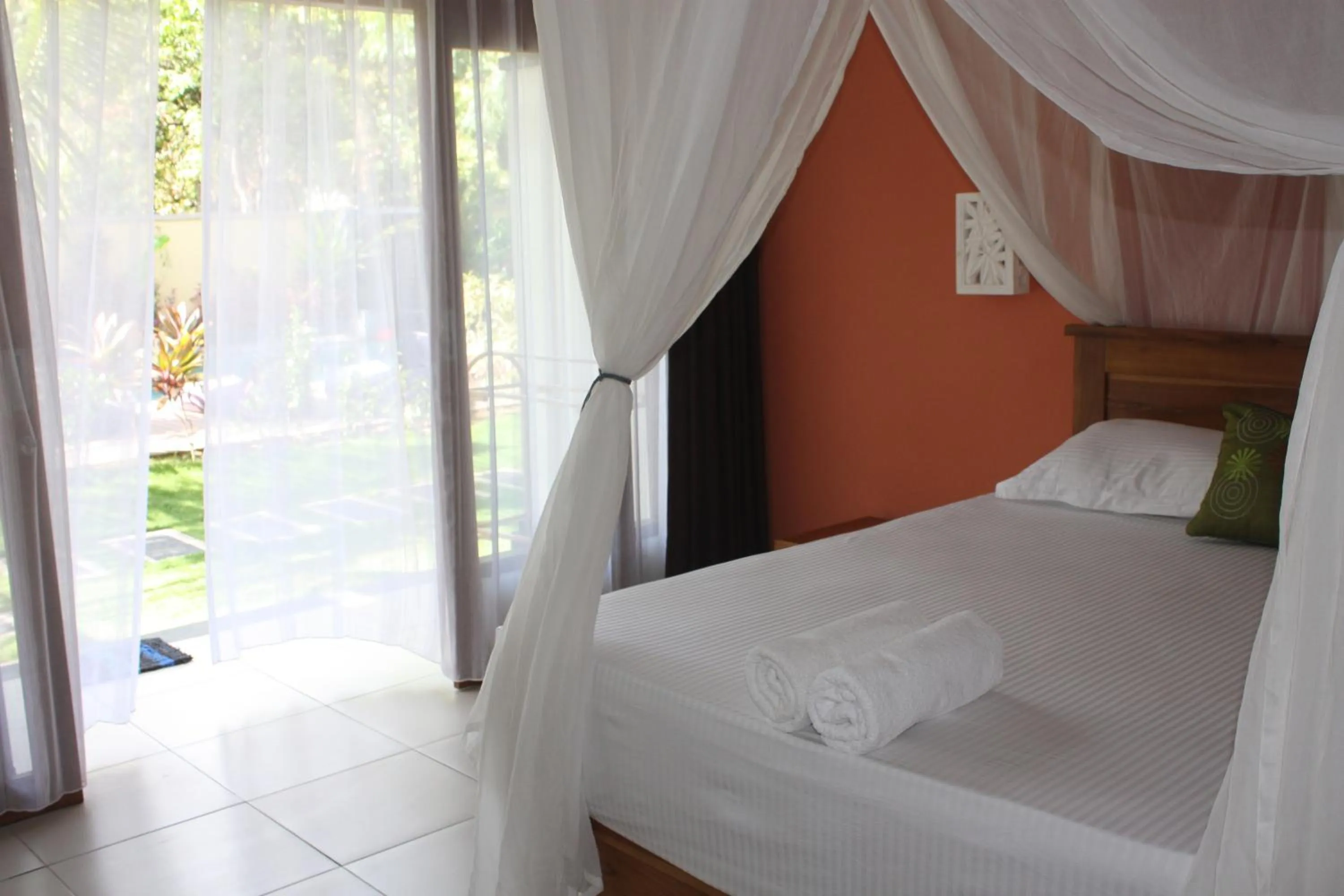 Bed in Arjuna Homestay