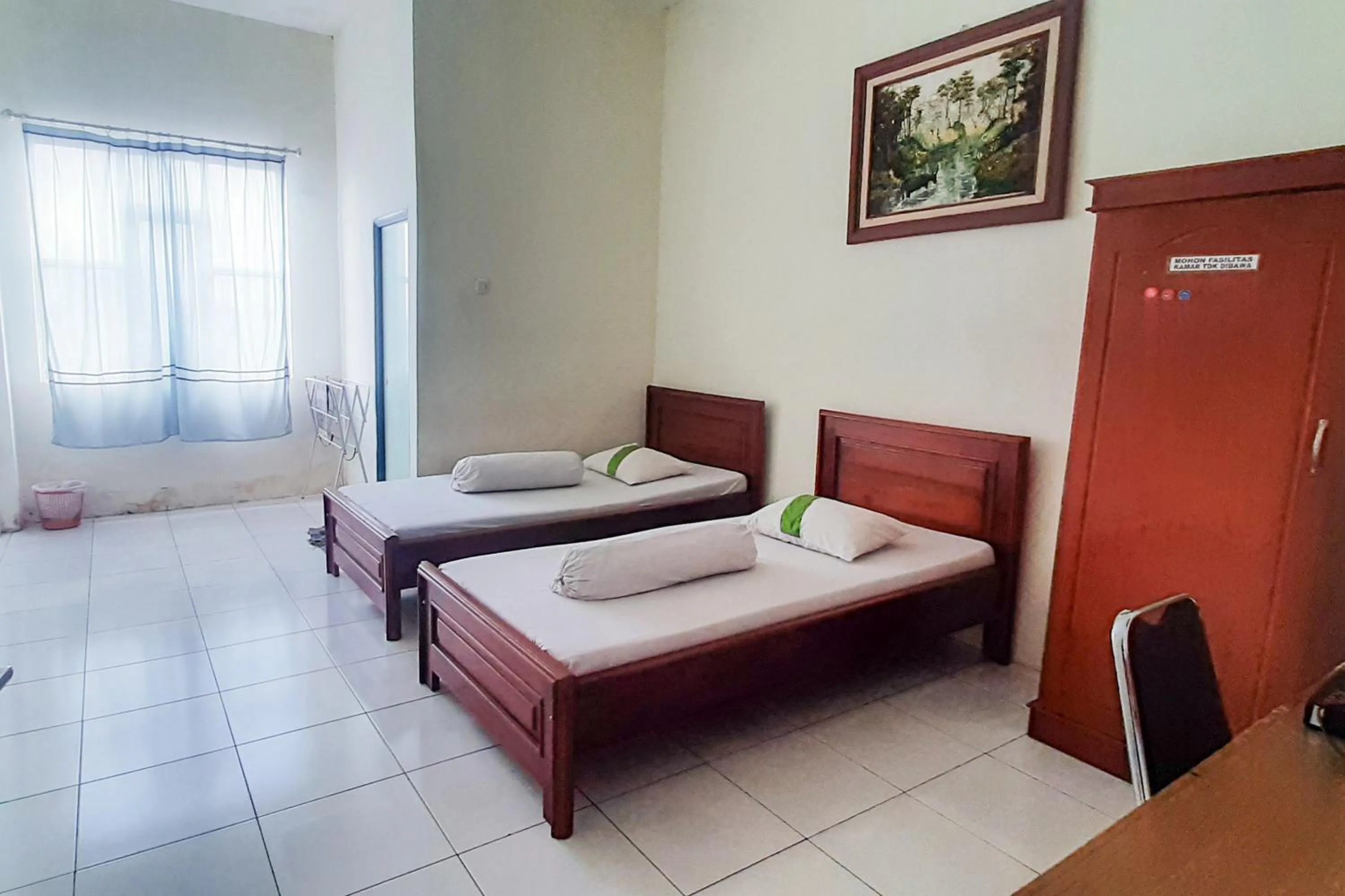 Bed in RedDoorz Syariah At Penginapan Sederhana Palembang