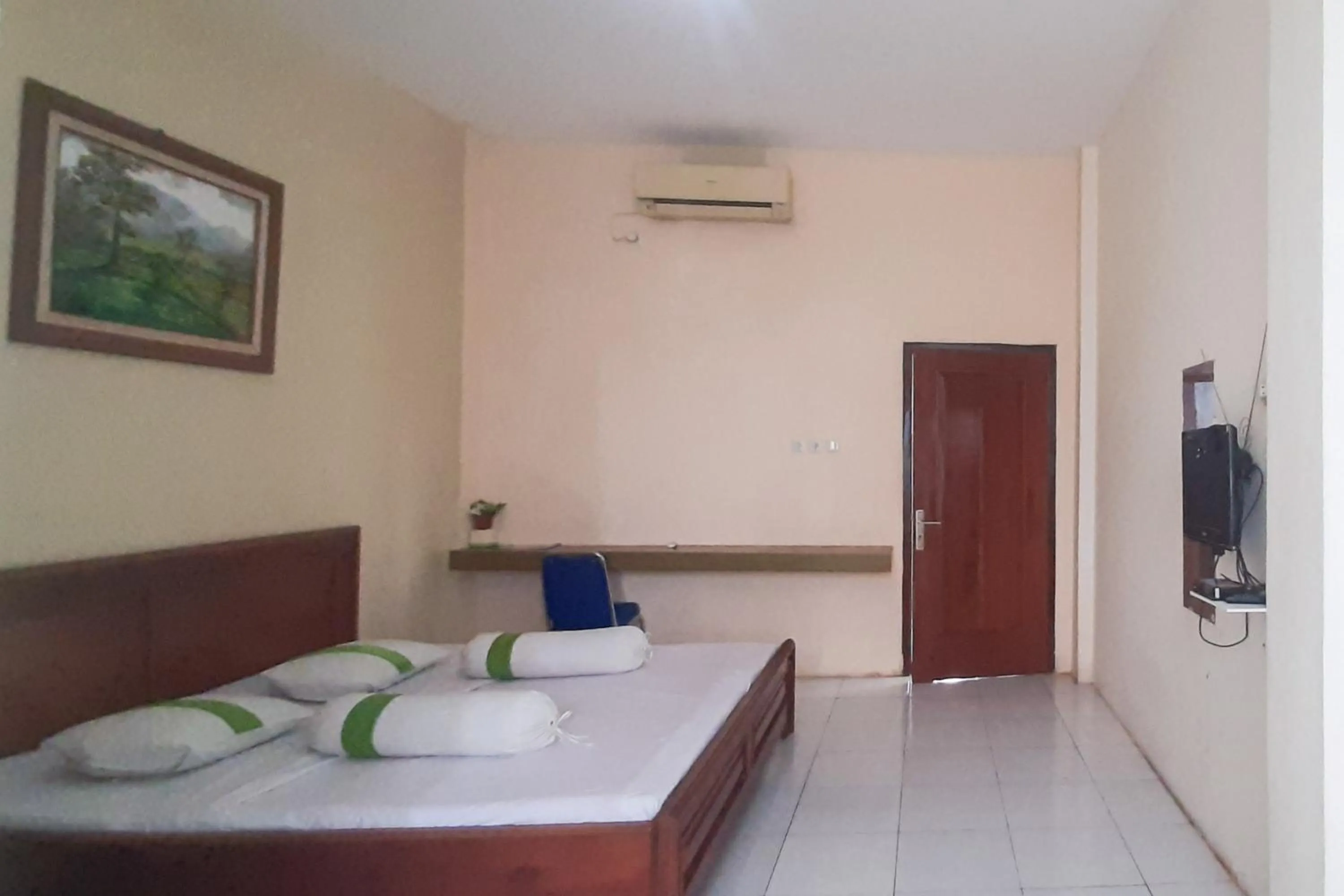 Bed in RedDoorz Syariah At Penginapan Sederhana Palembang