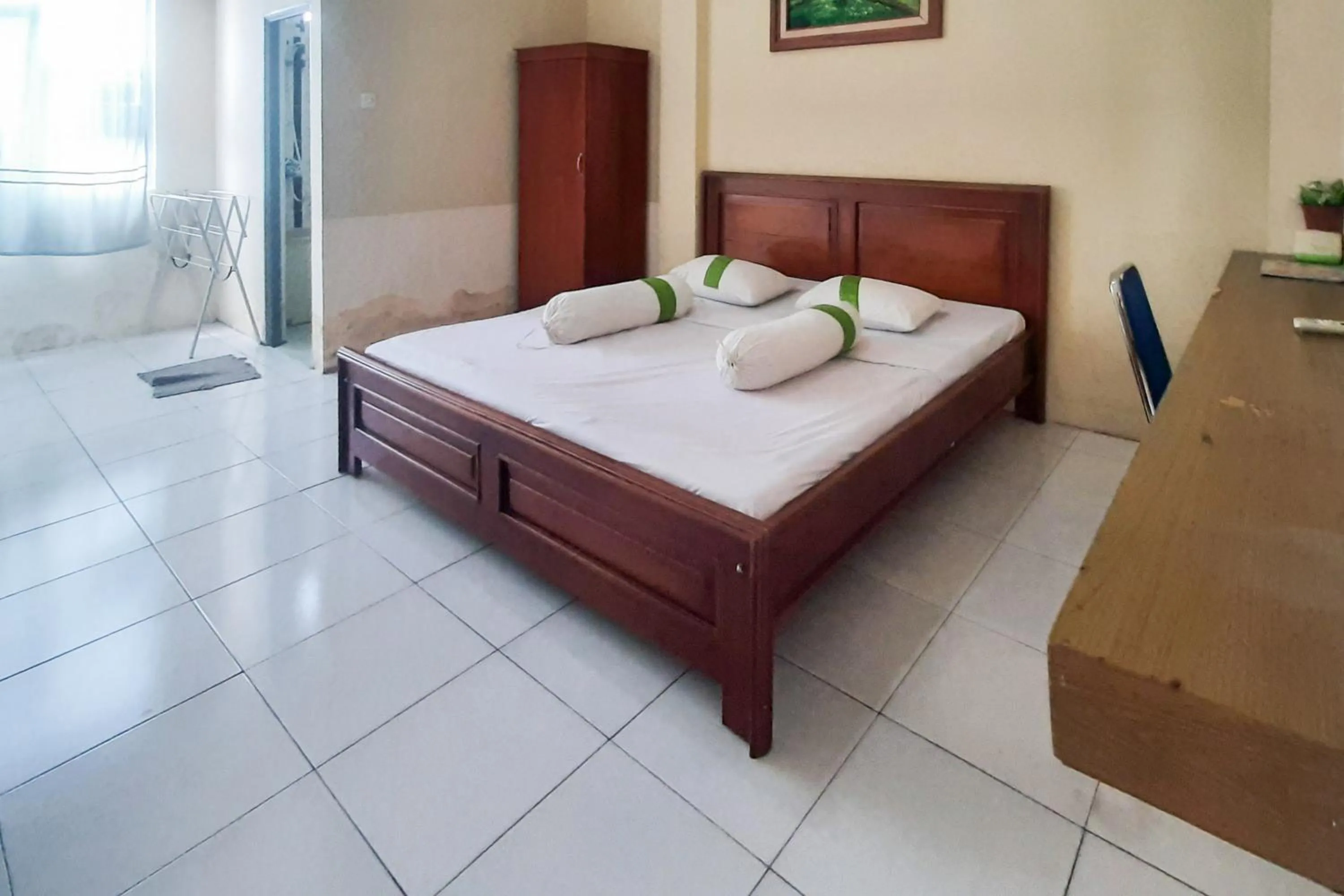 Bed in RedDoorz Syariah At Penginapan Sederhana Palembang