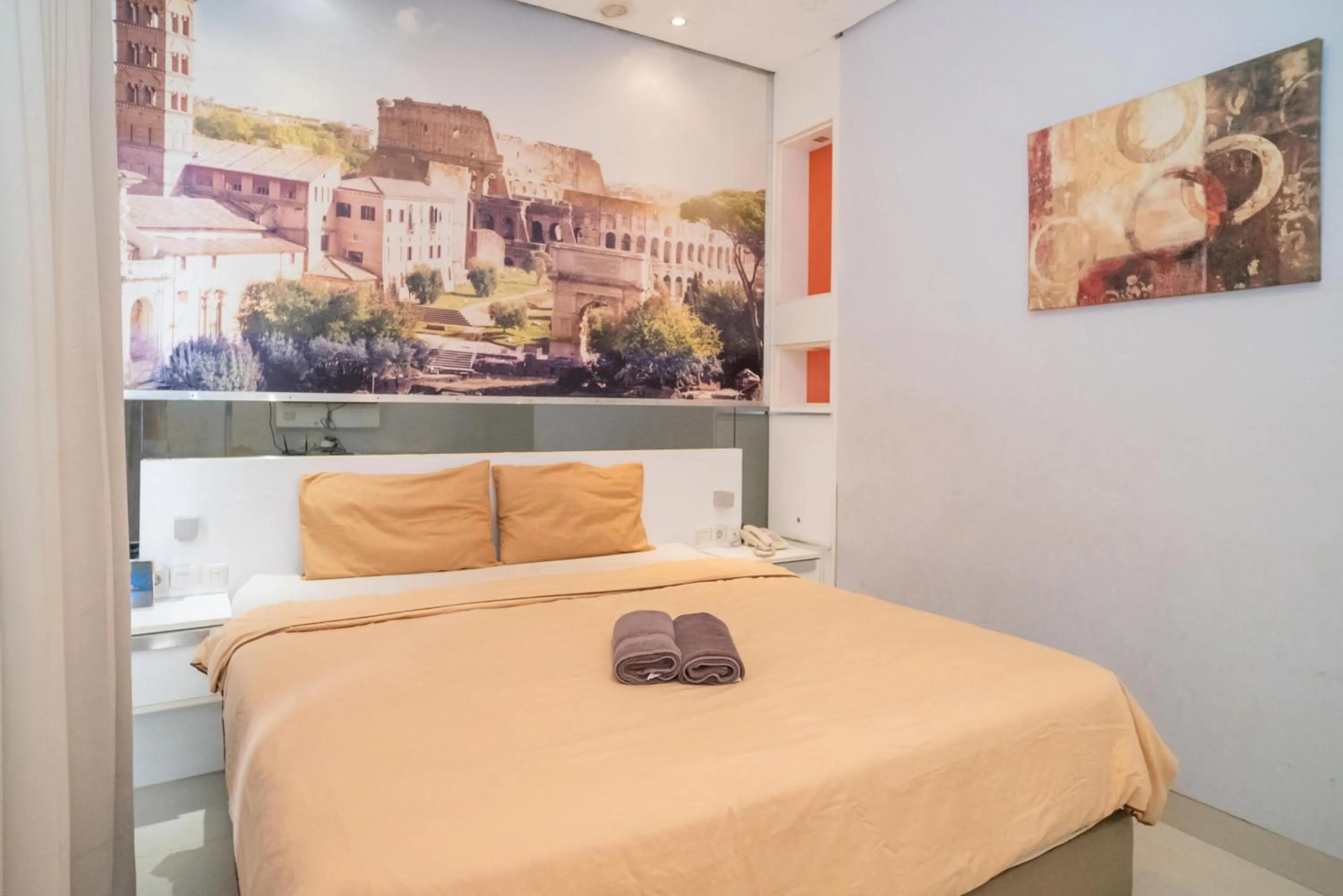 Photo of the whole room, Bed in RedDoorz at Tirta Mansion Paramount Gading