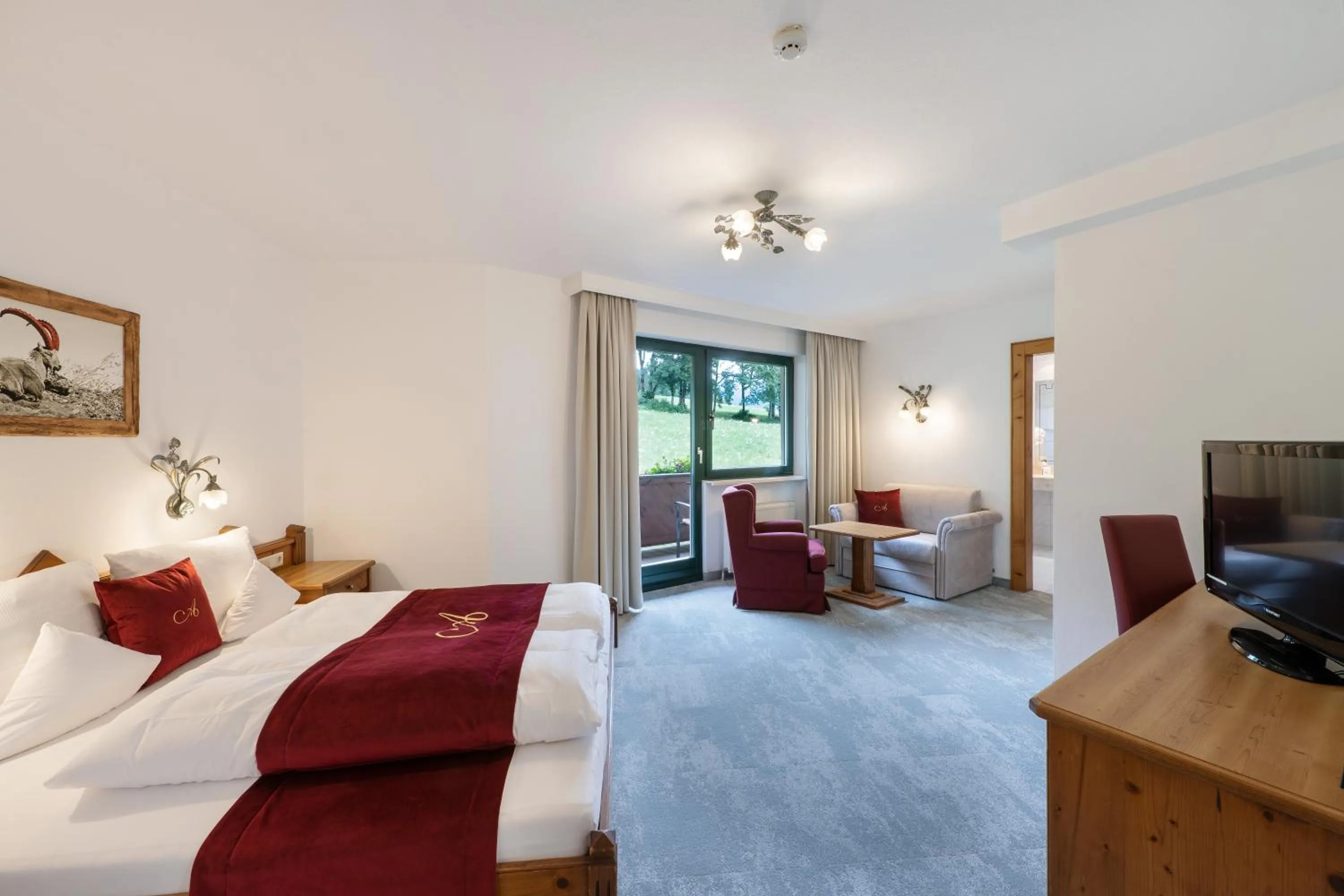 Photo of the whole room, Bed in Hotel AlpenSchlössl