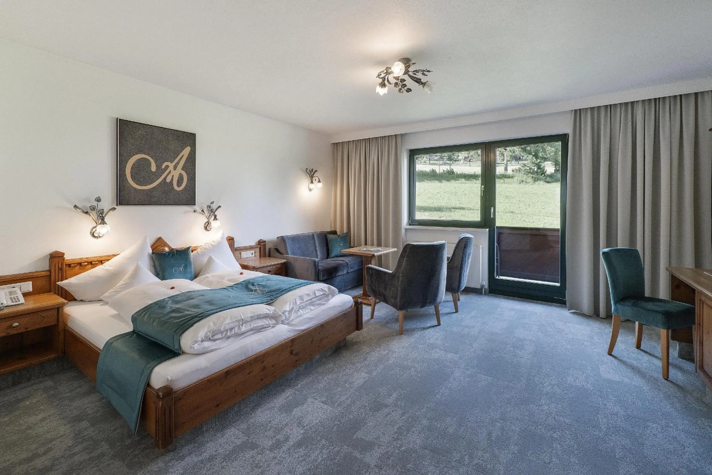 Photo of the whole room, Bed in Hotel AlpenSchlössl