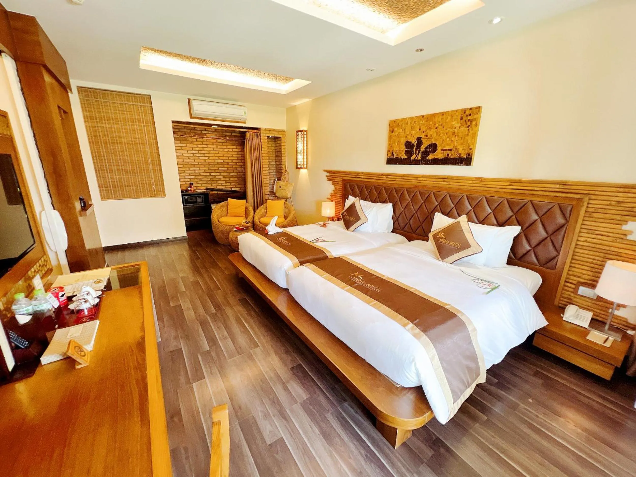 Bed in Aroma Beach Resort and Spa