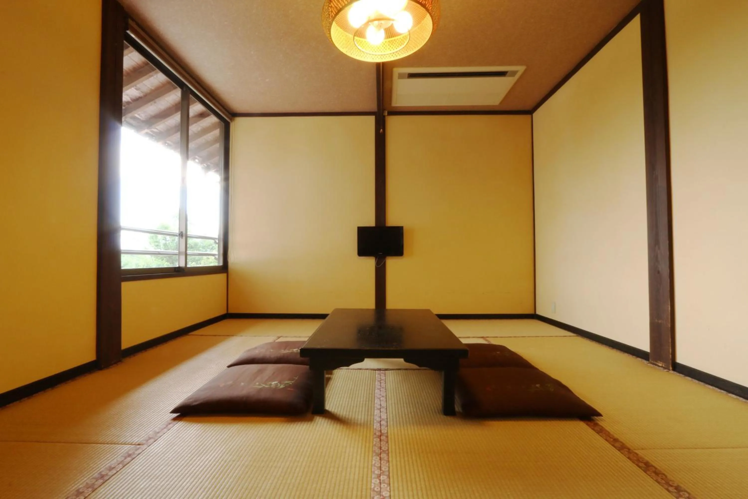 Bed in Tabinoyado Asonoyu